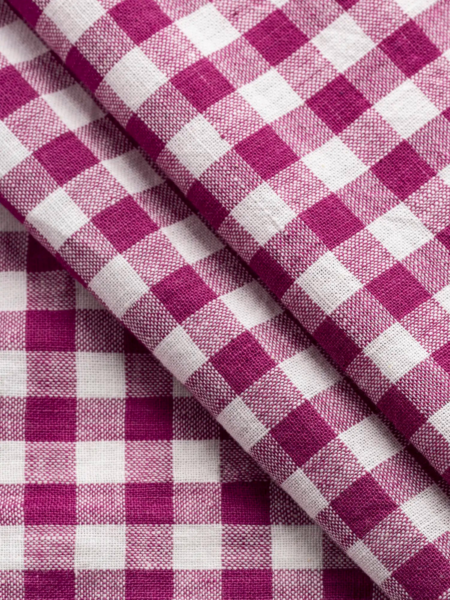 F-COT352-010-Bonbon-Handwoven-Gingham-Cotton-Raspberry-and-Ivory-Core-Fabrics-fold.webp.webp