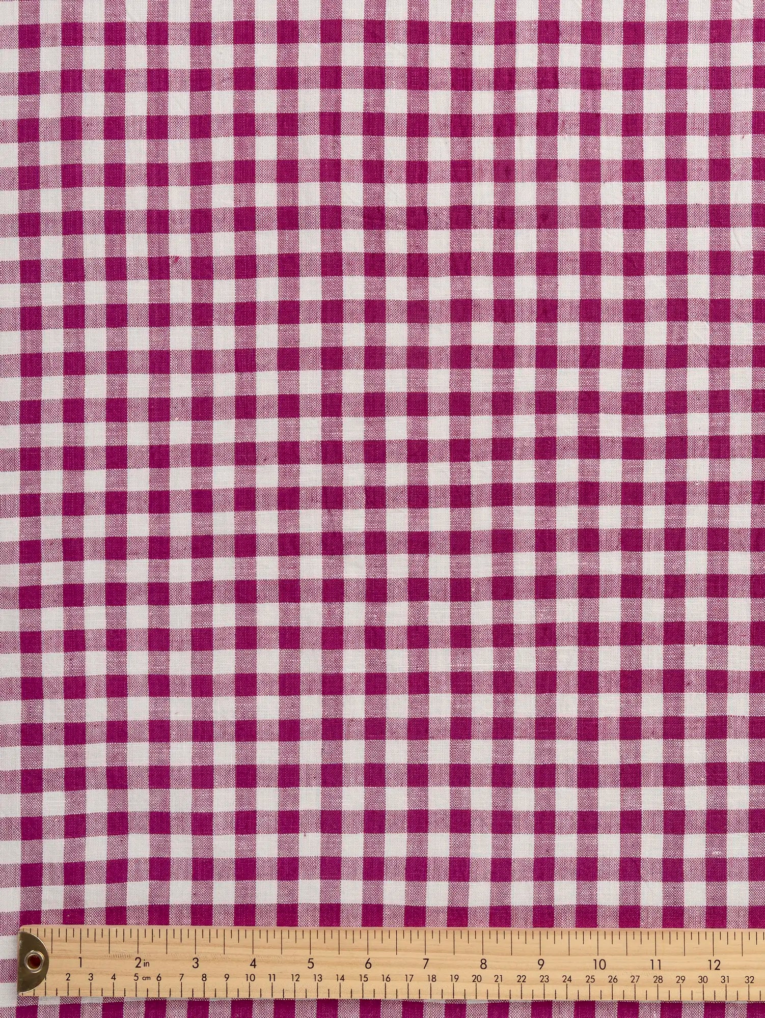 F-COT352-010-Bonbon-Handwoven-Gingham-Cotton-Raspberry-and-Ivory-Core-Fabrics-ruler.webp