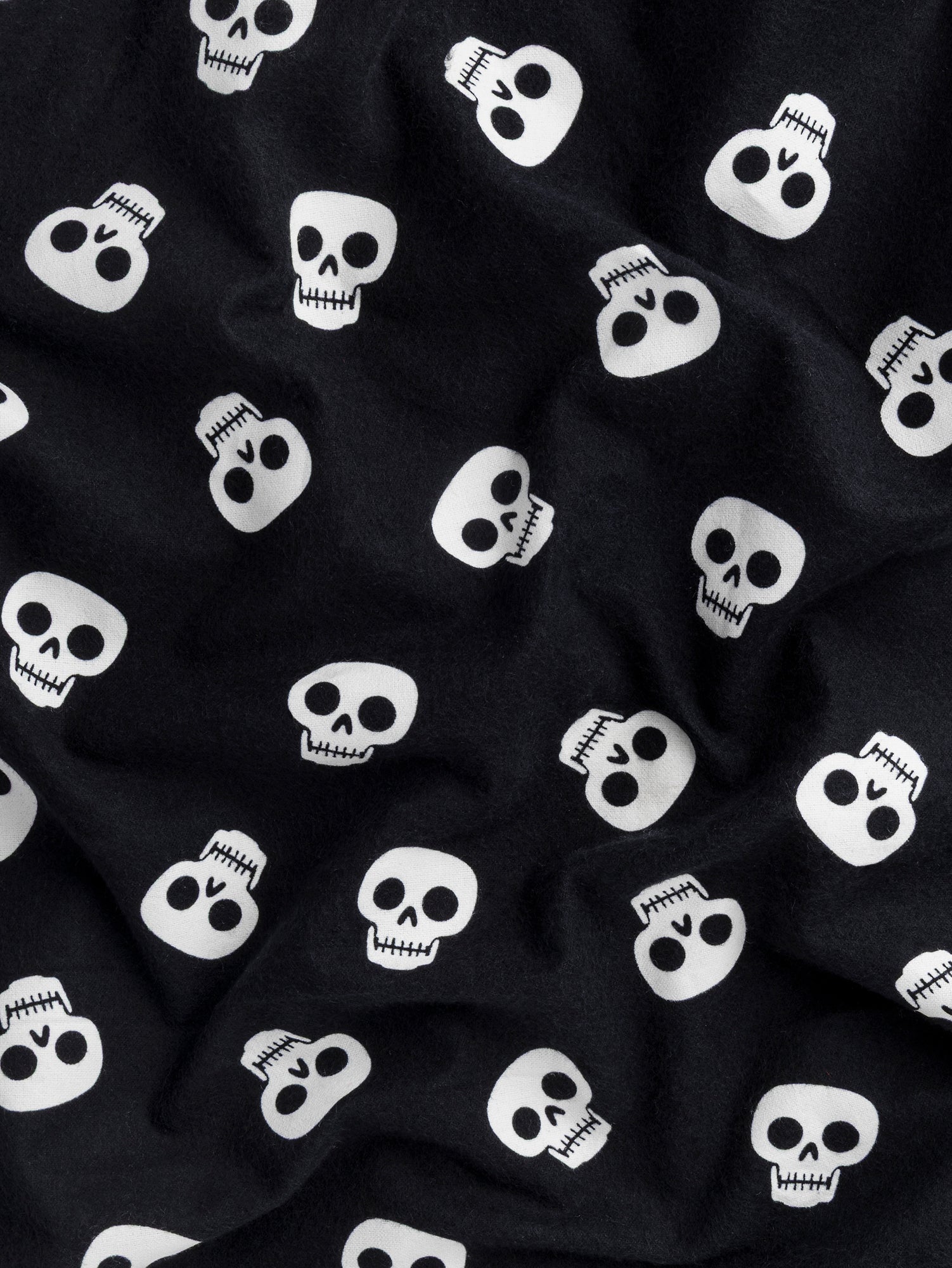 F-COT422 - Bone Chillin Skull Print Cotton Flannel Deadstock - Black + White - Core Fabrics- scrunched.JPG