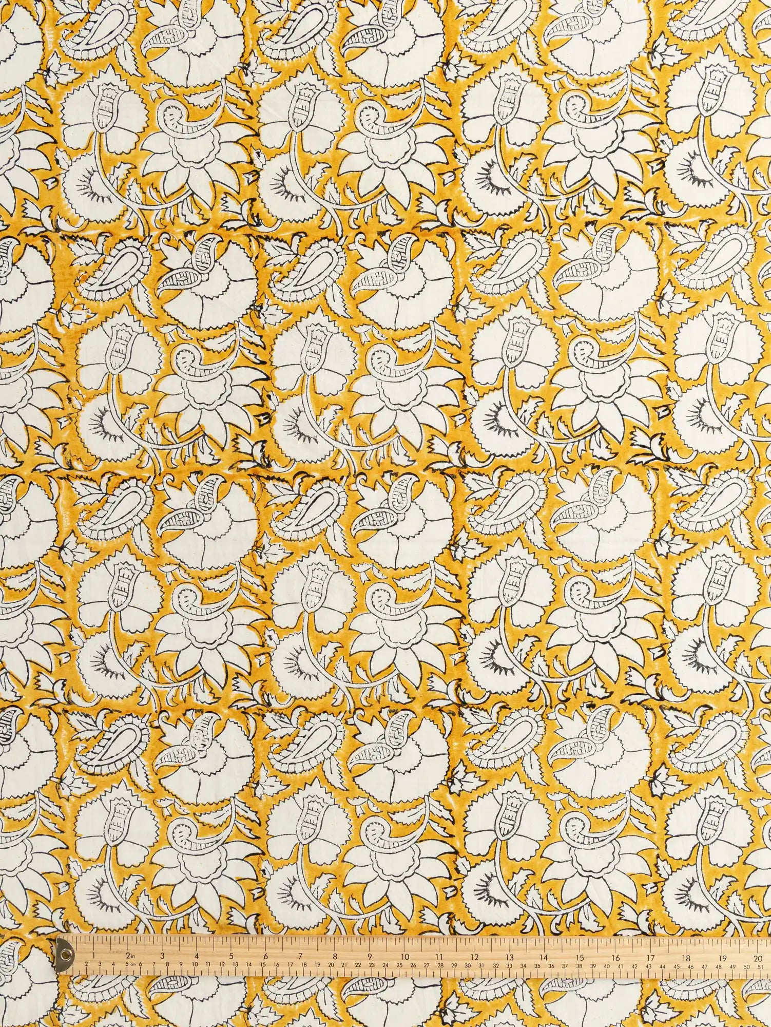 F-COT488-Boteh-Block-Print-Cotton-Poplin-Marigold-Oat-and-Black-Core-Fabrics-ruler.webp