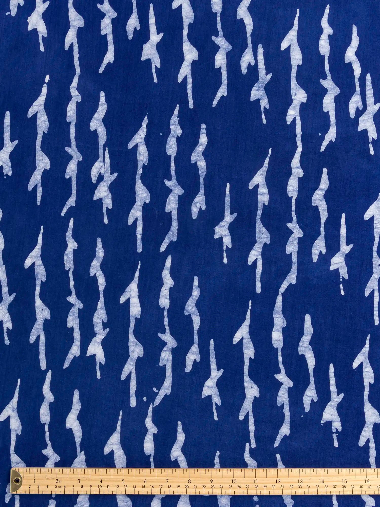 F-COT427-Branch-Artisanal-Cotton-Batik-Cobalt-Core-Fabrics-ruler.webp