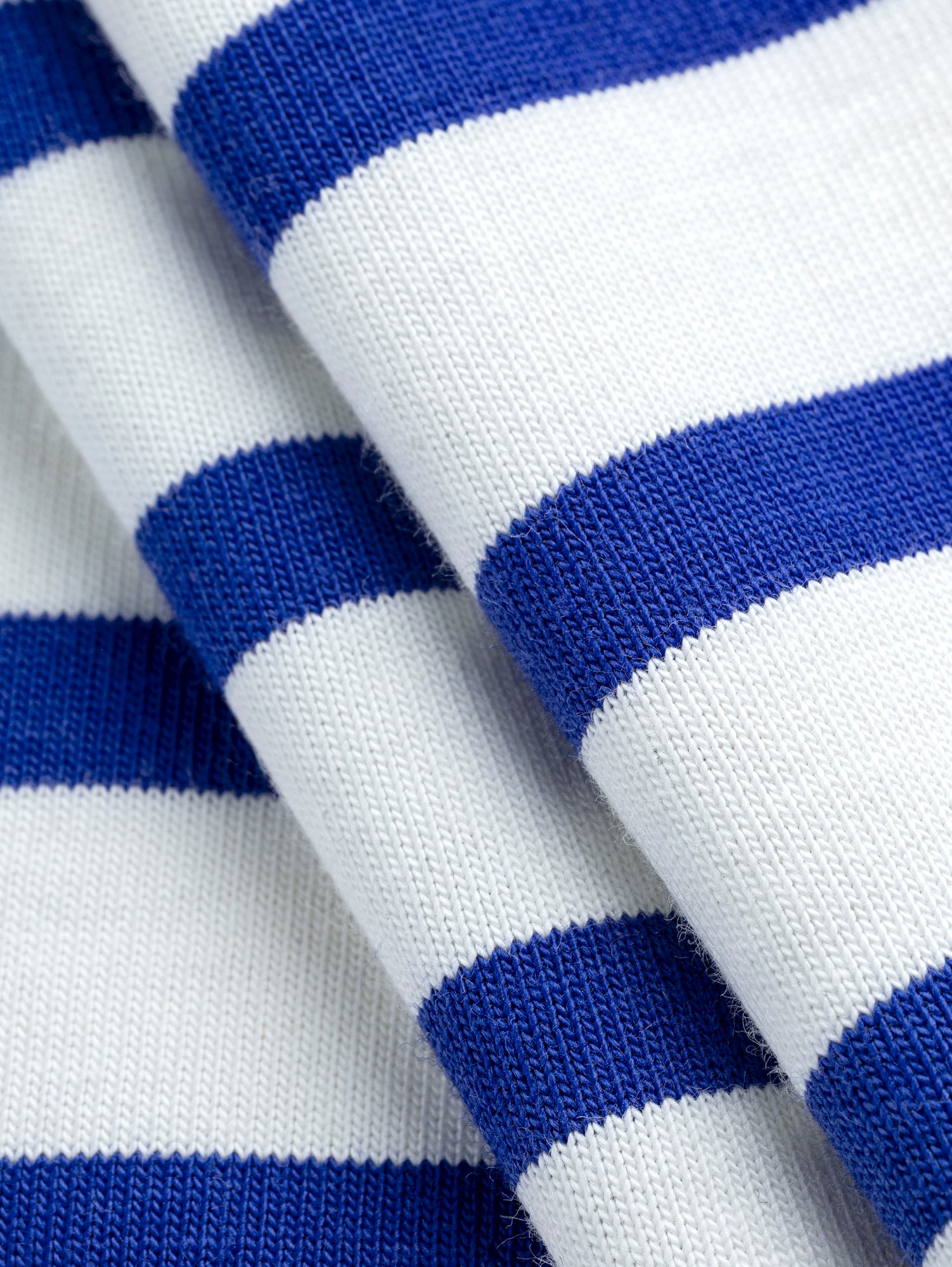 F-COT241-010-Breton-Stripe-Organic-Cotton-Jersey-Knit-Cream-and-Bright-Blue-Core-Fabrics-fold.JPG