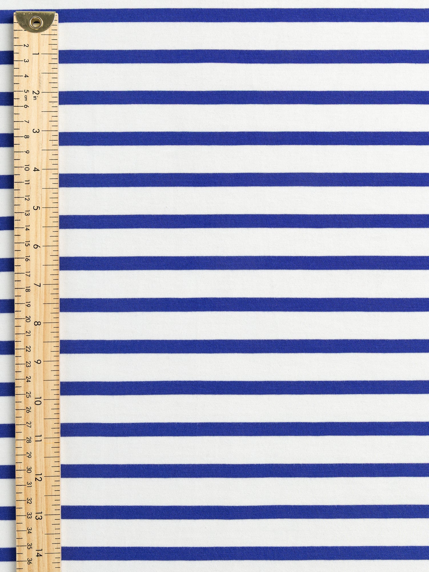 F-COT241-010-Breton-Stripe-Organic-Cotton-Jersey-Knit-Cream-and-Bright-Blue-Core-Fabrics-ruler.JPG