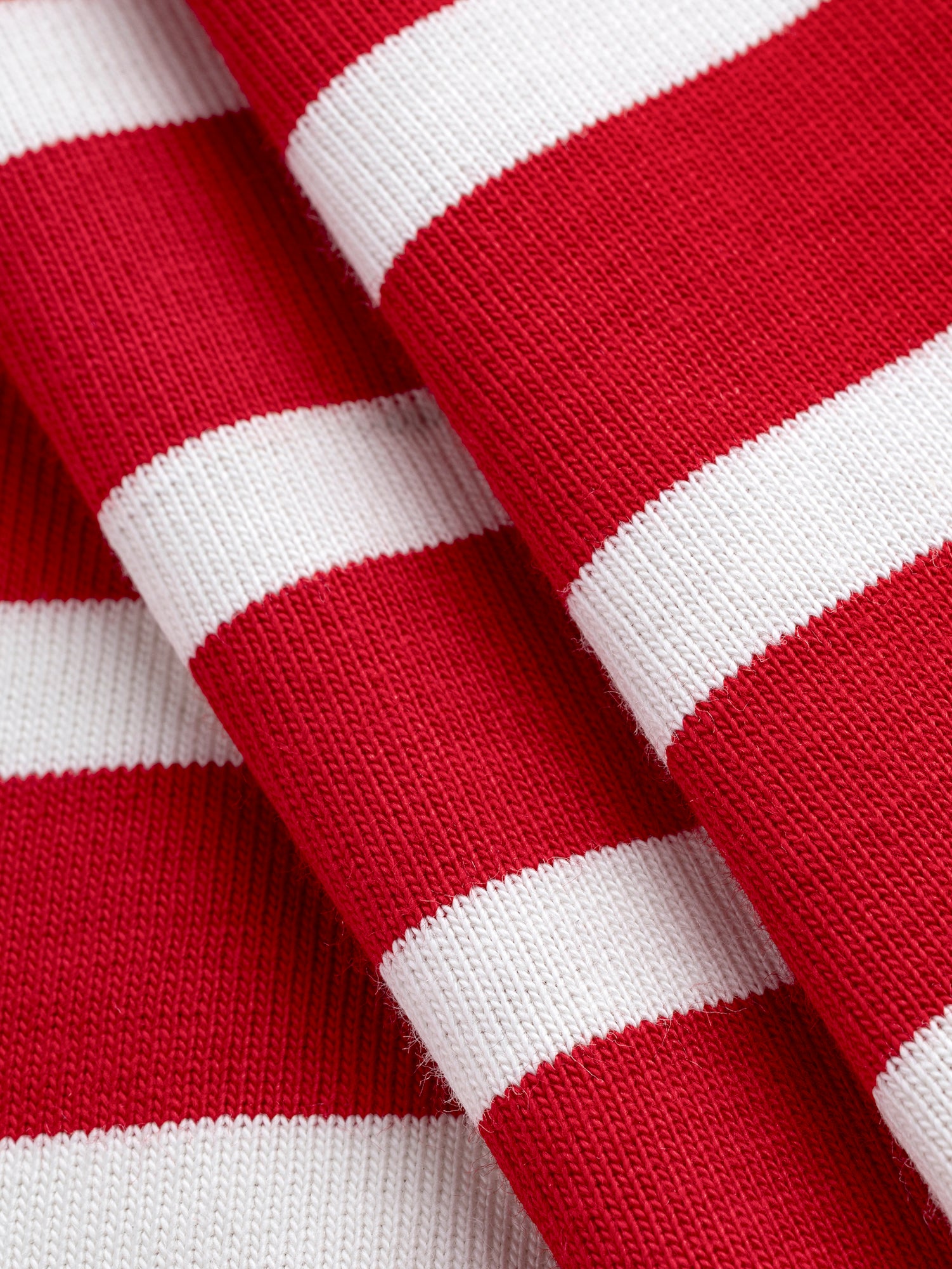 F-COT241-006-Breton-Stripe-Organic-Cotton-Jersey-Knit-Red-and-Cream-Core-Fabrics-fold.JPG