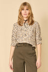 F-DEA029-Brush-Print-Viscose-Dobby-Deadstock-Cream-Steel-and-Ochre-Core-Fabrics-model.webp