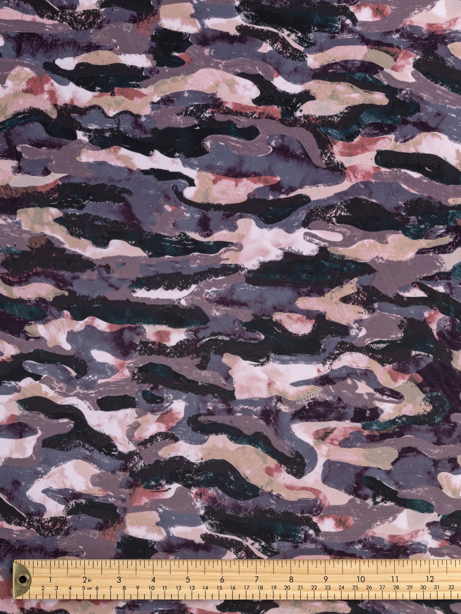 F-DEA136-Camo-Print-Polyester-Stretch-Knit-Deadstock-Rosewood-Core-Fabrics-ruler.JPG