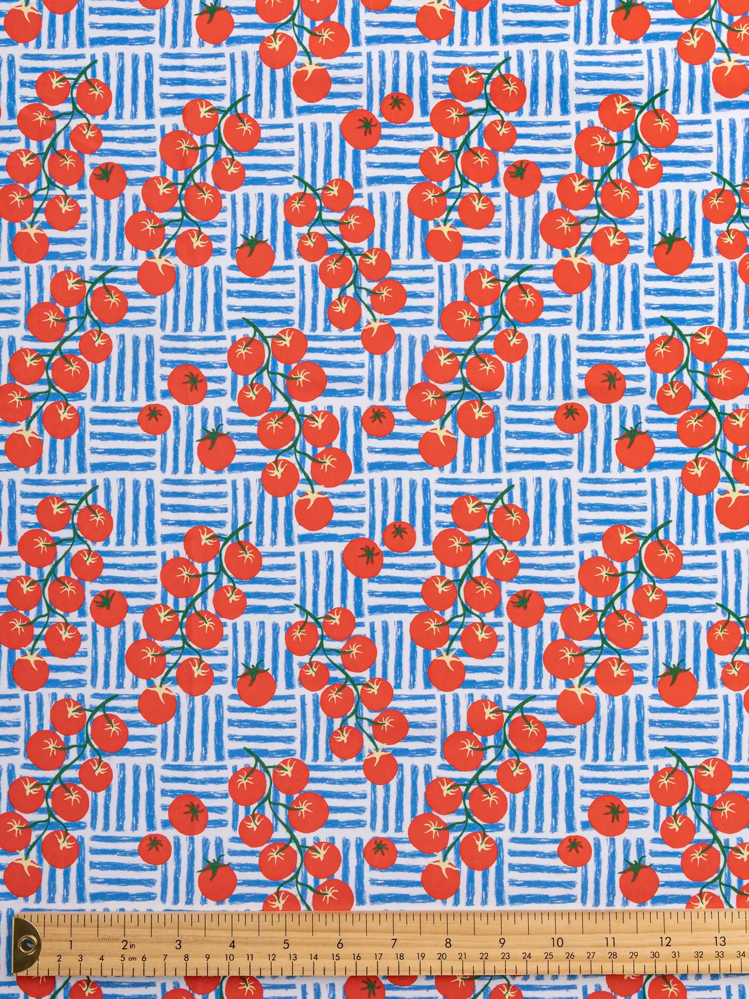 F-NYL024-Caprese-Tomato-Print-Swim-Performance-Knit-Red-Blue-and-White-Core-Fabrics-ruler.webp