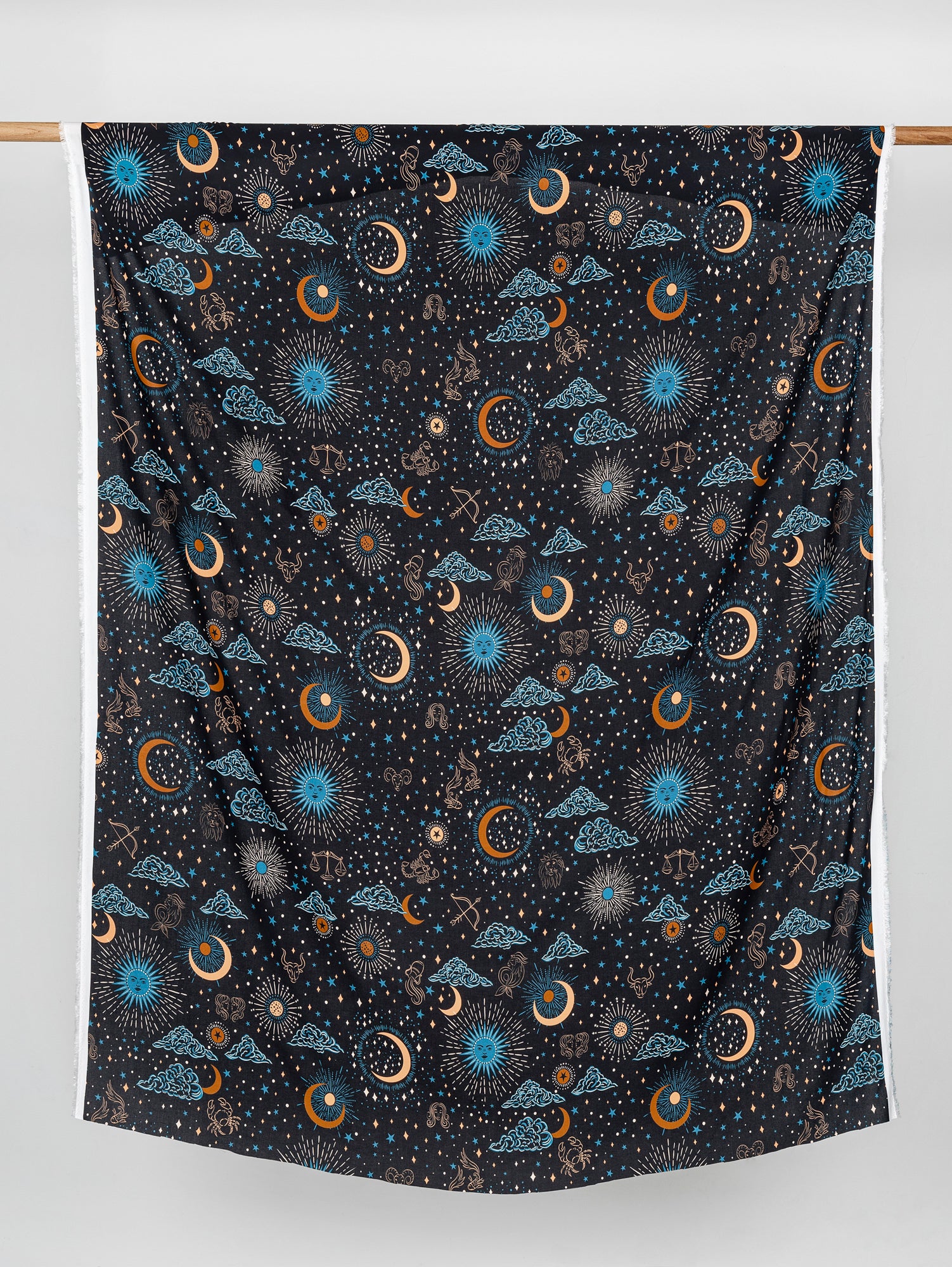 F-VIS229-Celestial-Zodiac-Print-Ecovero-Viscose-Black-Blue-Cream-Ochre-Core-Fabrics-draped