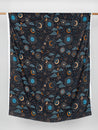 F-VIS229-Celestial-Zodiac-Print-Ecovero-Viscose-Black-Blue-Cream-Ochre-Core-Fabrics-draped