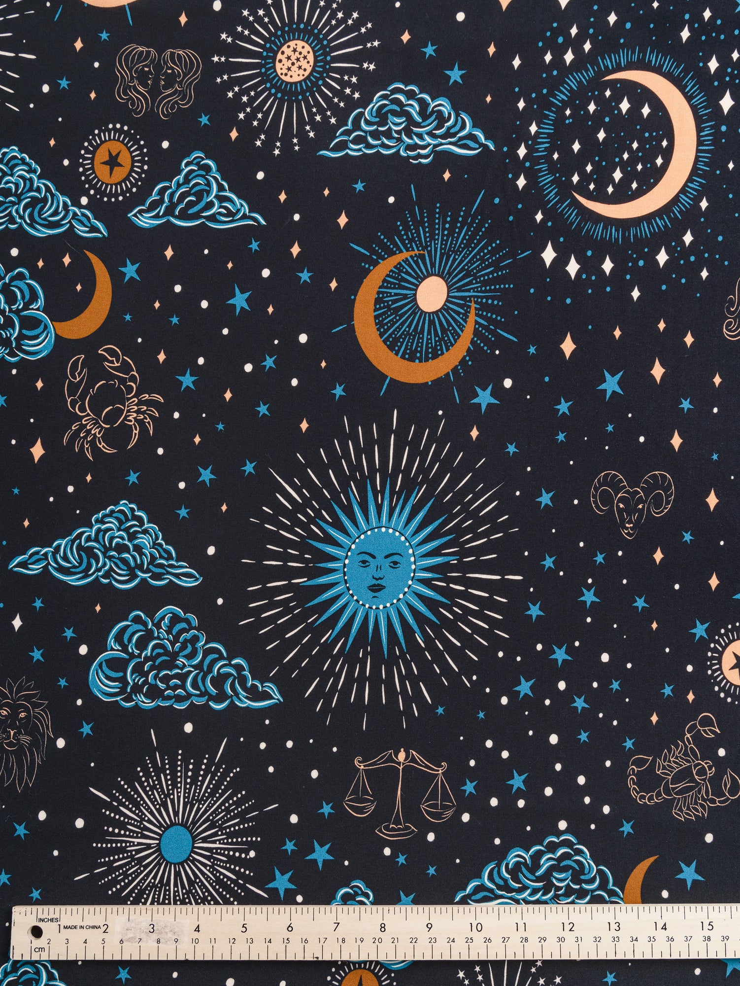 F-VIS229-Celestial-Zodiac-Print-Ecovero-Viscose-Black-Blue-Cream-Ochre-Core-Fabrics-ruler