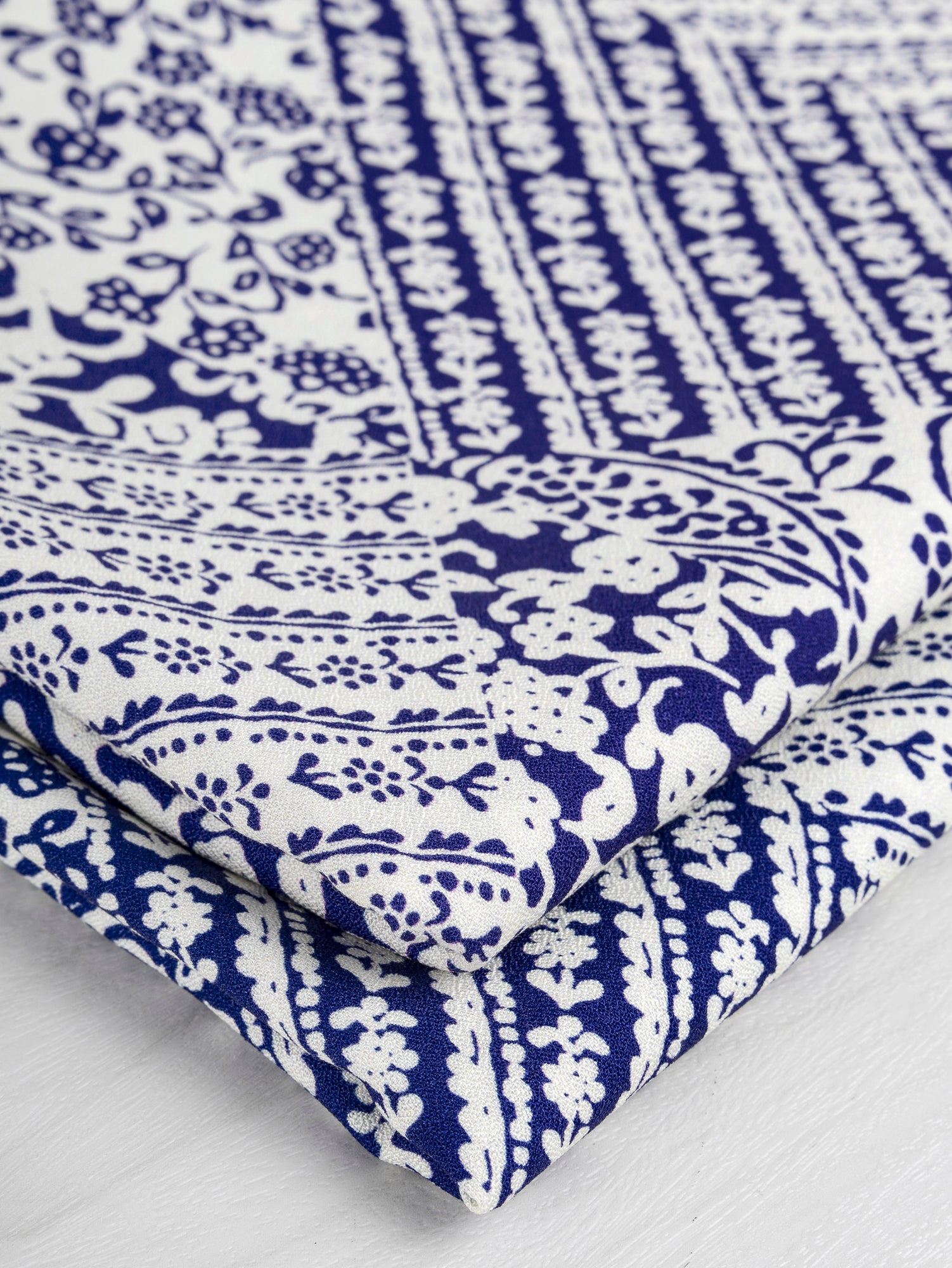 F-VIS237-Ceramic-Bloom-Print-Ecovero-Viscose-Cobalt-and-Cream-Core-Fabrics-fold.JPG