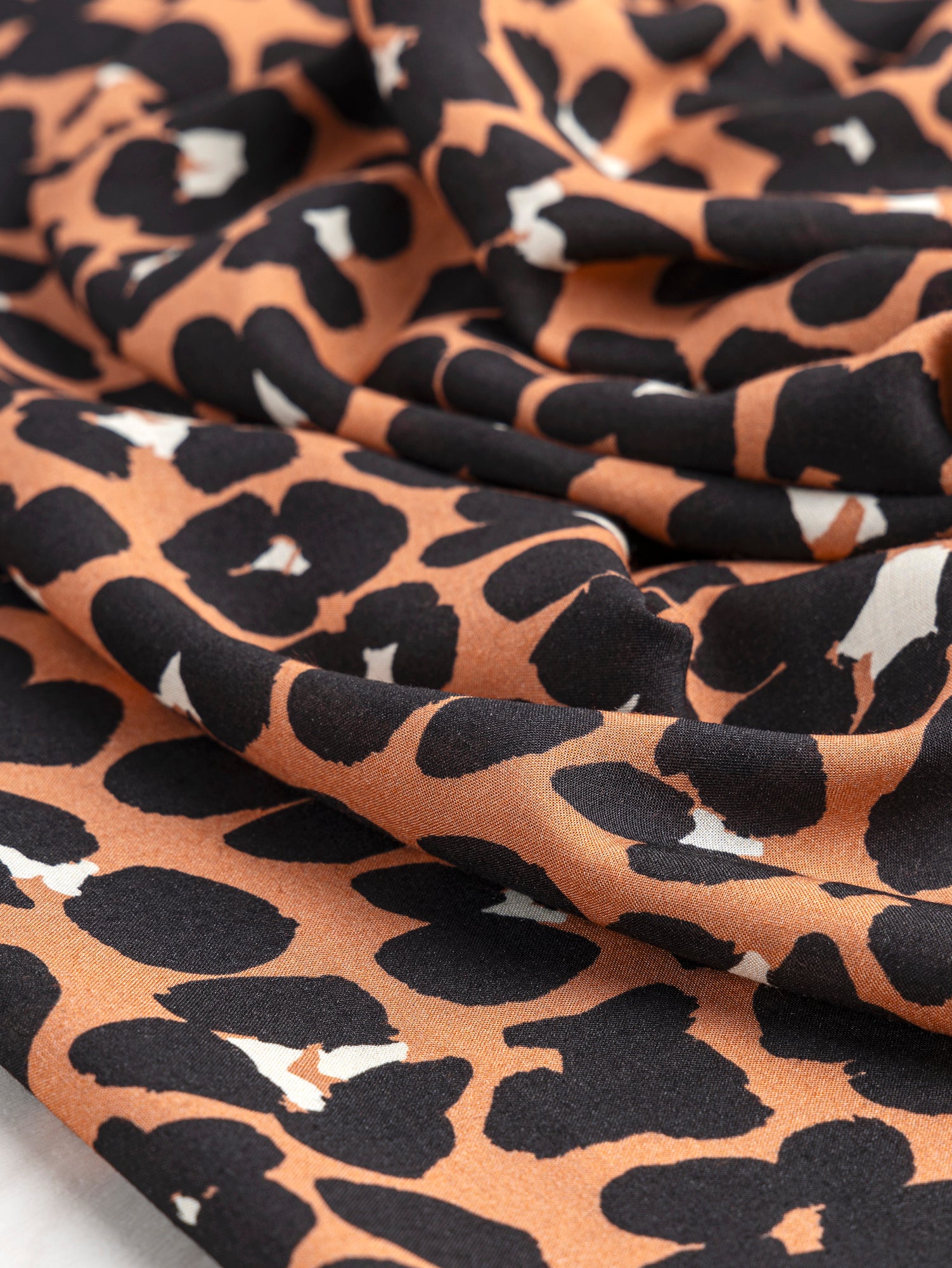 Cheetah Print Ecovero Viscose Challis Deadstock - Sienna + Black + Cream | Core Fabrics