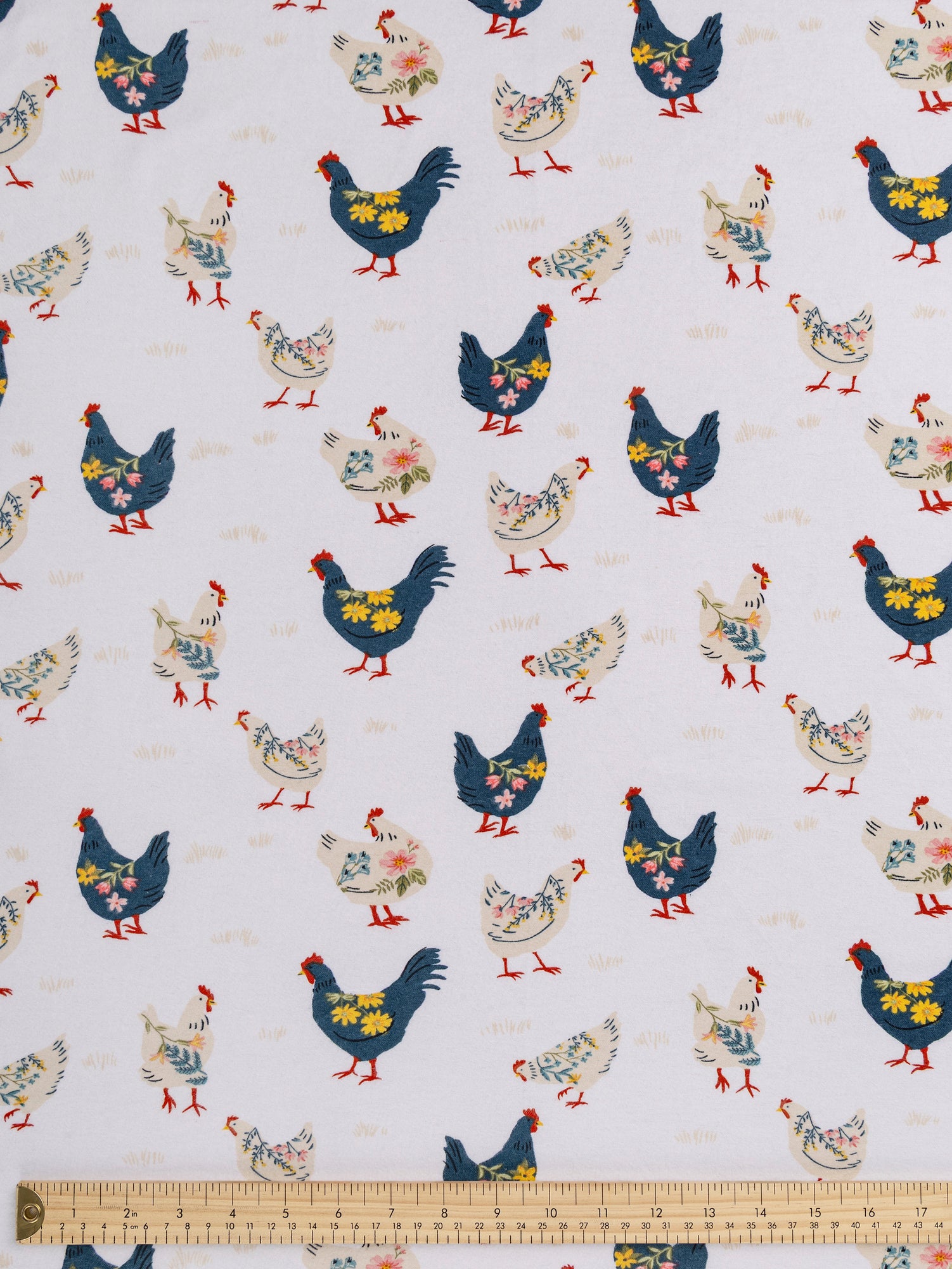 F-COT429-Chicken-Print-Cotton-Flannel-Deadstock-White-Blue-Yellow-Beige-Core-Fabrics-ruler.JPG