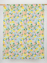 F-COT345-Citrus-Picnic-Print-Cotton-Voile-White-Green-and-Yellow-Core-Fabrics-draped.JPG