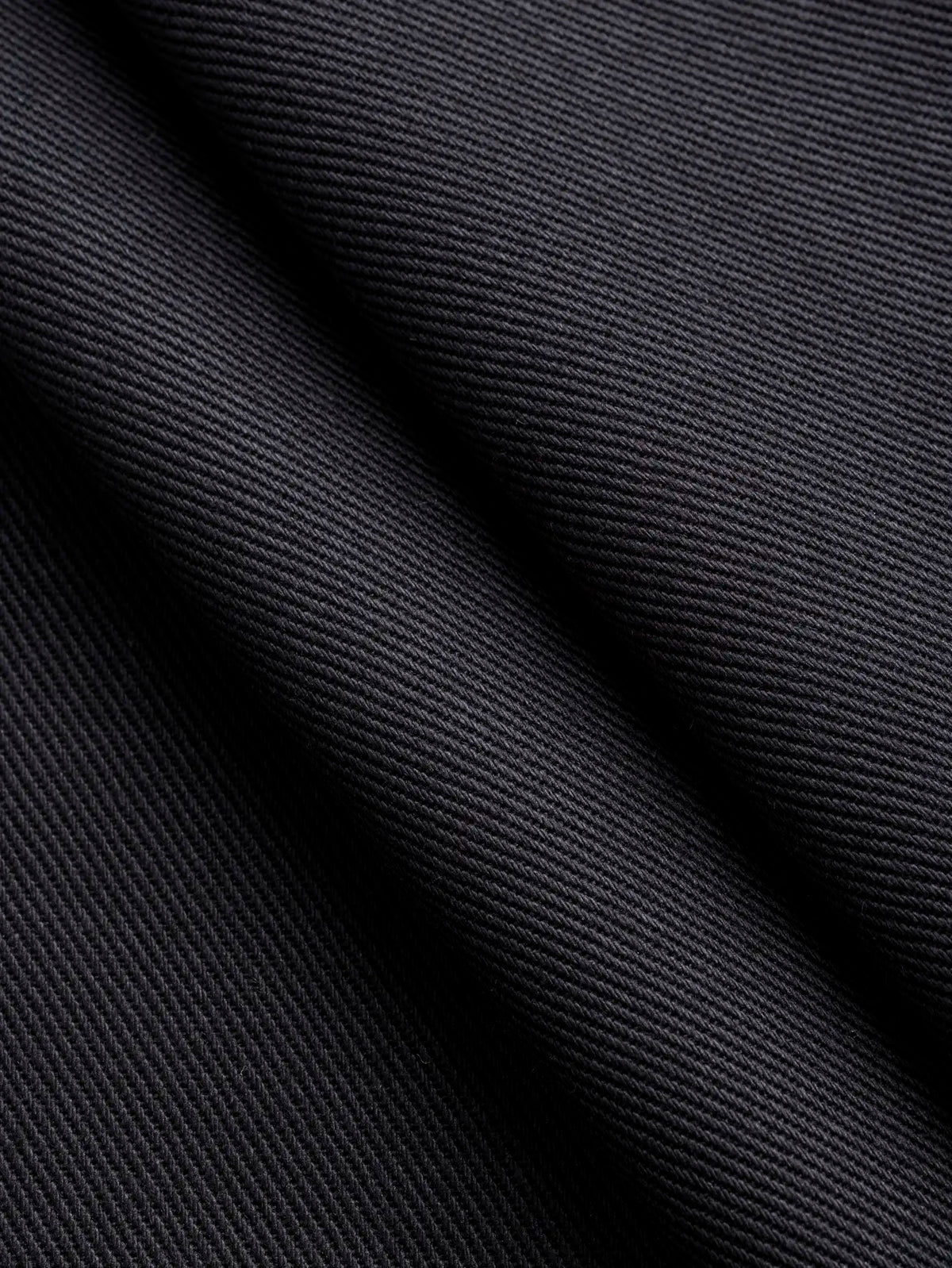 F-COT483-001-Classic-Non-Stretch-Cotton-Twill-Black-Core-Fabrics-fold.webp