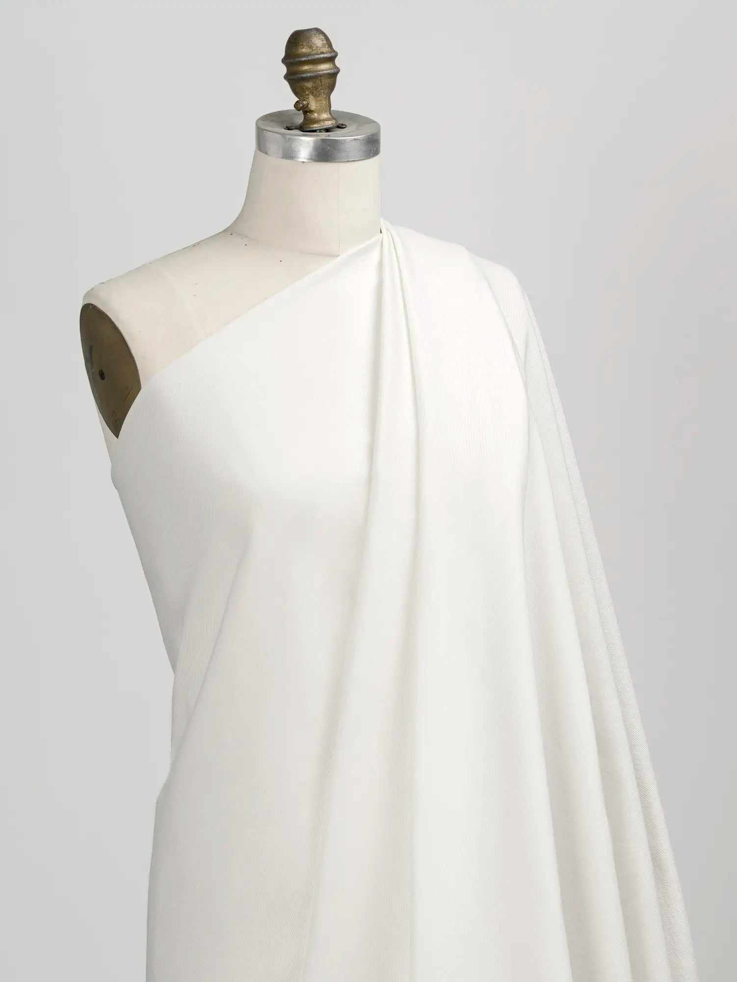 F-COT483-002-Classic-Non-Stretch-Cotton-Twill-Ivory-Core-Fabrics-draped.webp