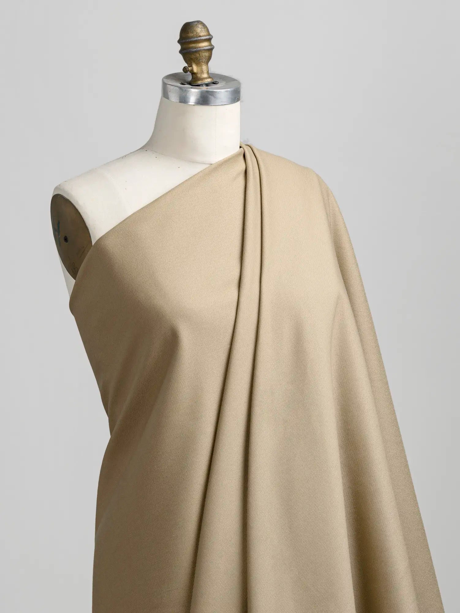 F-COT483-006-Classic-Non-Stretch-Cotton-Twill-Sand-Core-Fabrics-draped.webp