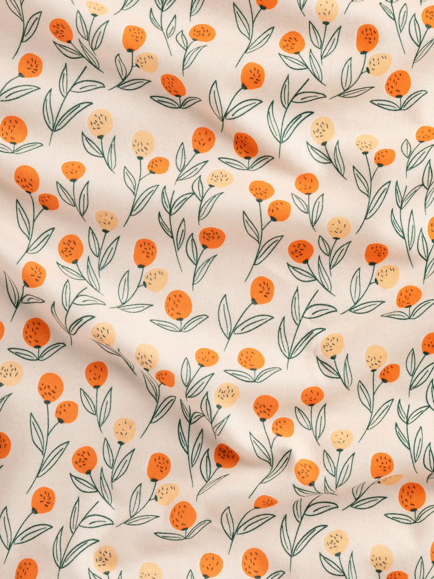 F-DEA236-Clementine-Print-Cotton-Jersey-Deadstock-Oat-Orange-and-Forest-Core-Fabrics-scrunched.webp