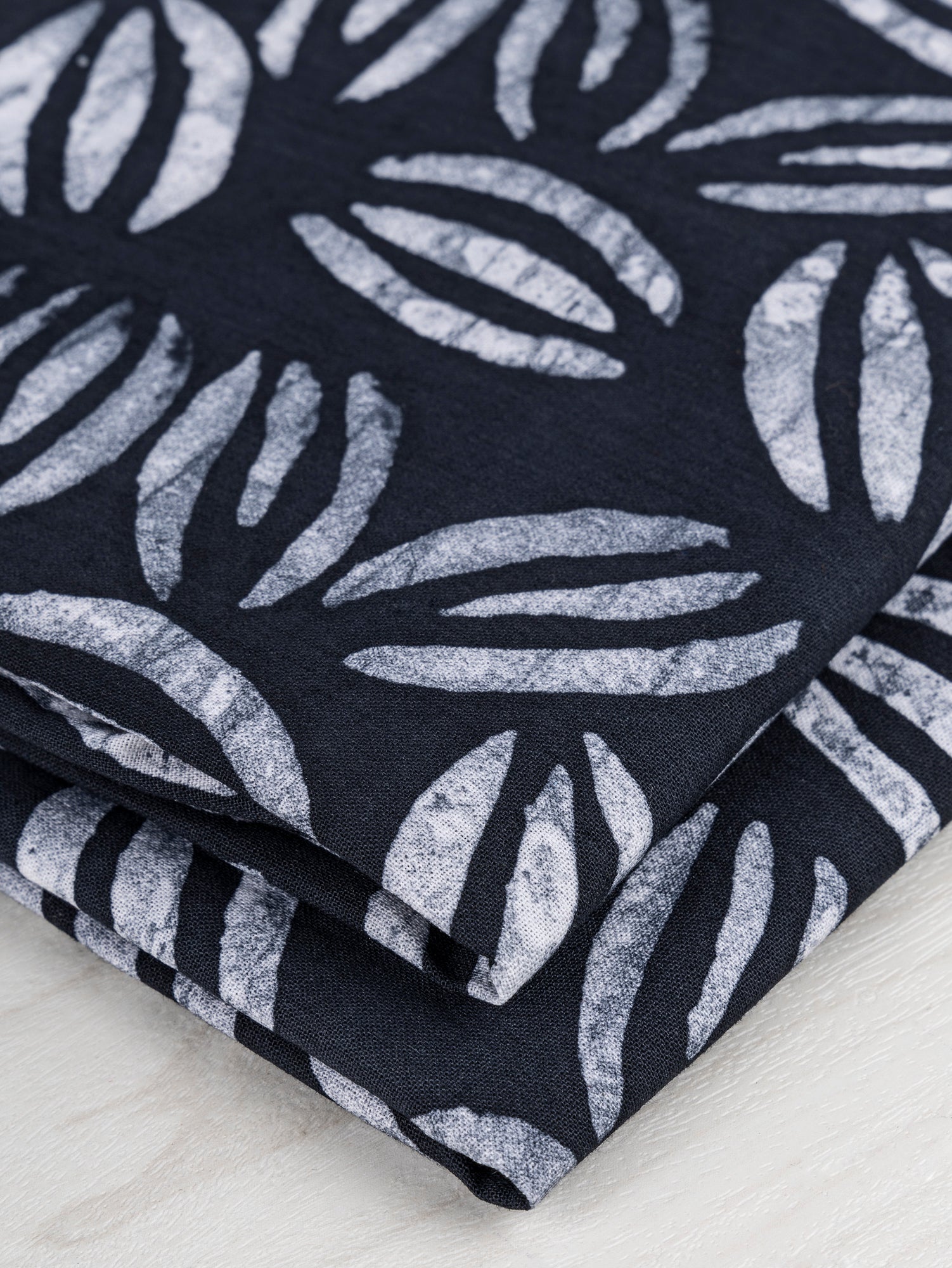 F-COT320-Coffee-Bean-Artisanal-Cotton-Batik-Black-White-Core-Fabrics-fold