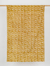 F-COT319-Coffee-Bean-Artisanal-Cotton-Batik-Ochre-White-Core-Fabrics-Draped
