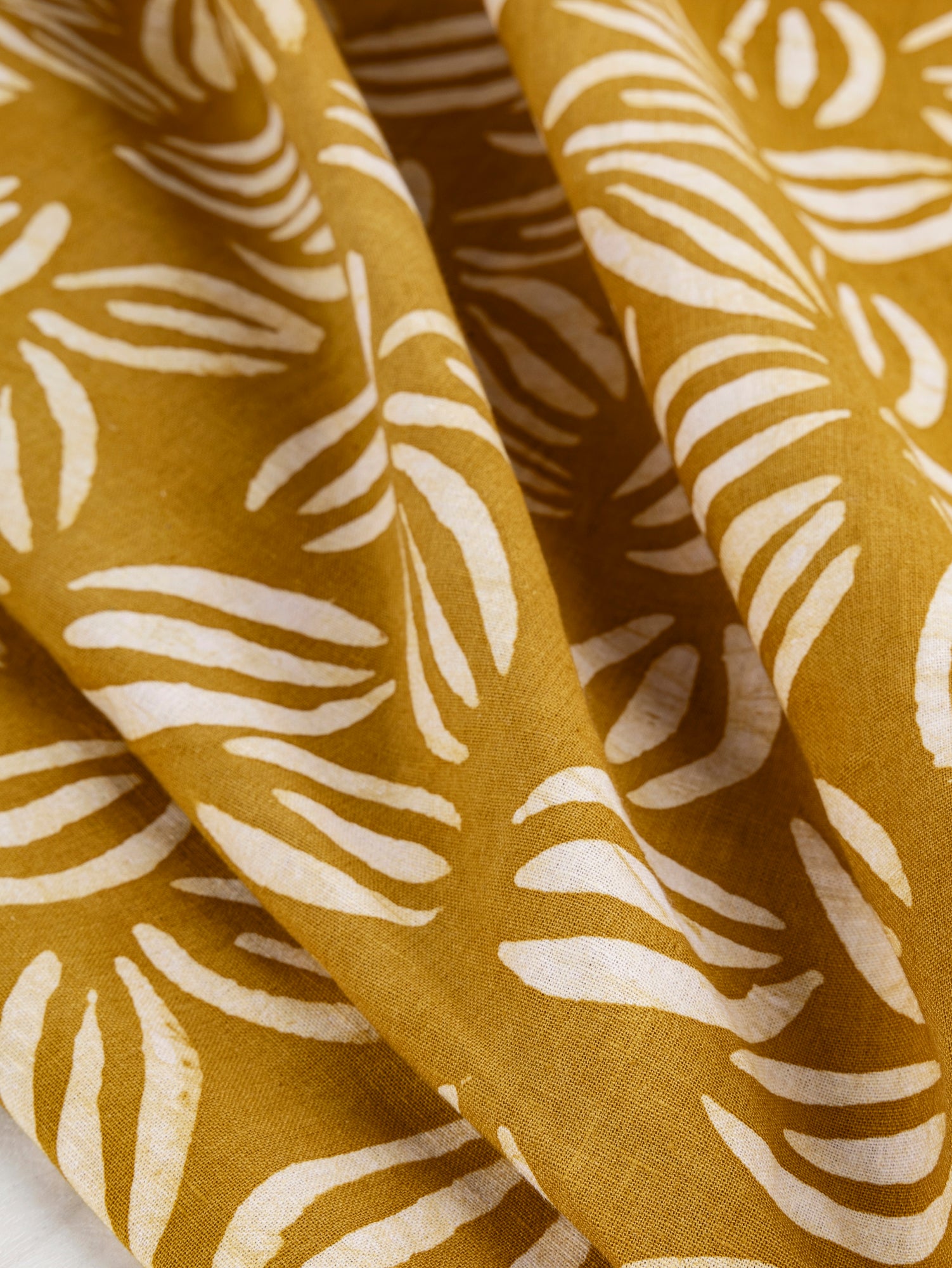 F-COT319-Coffee-Bean-Artisanal-Cotton-Batik-Ochre-White-Core-Fabrics-scrunched