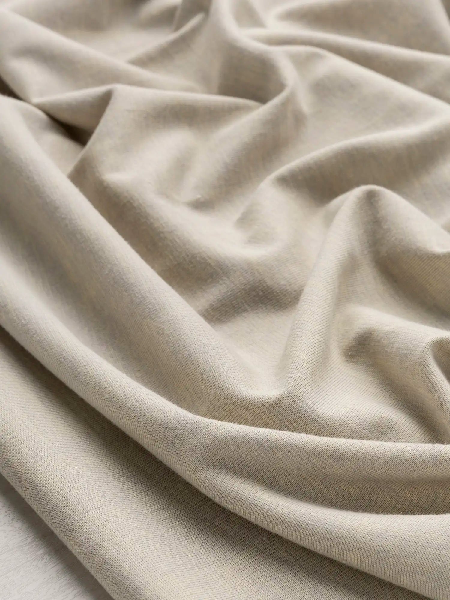 F-DEA158-Cotton-Blend-Jersey-Deadstock-Heather-Grey-Pale-Yellow-Core-Fabrics-scrunched.webp