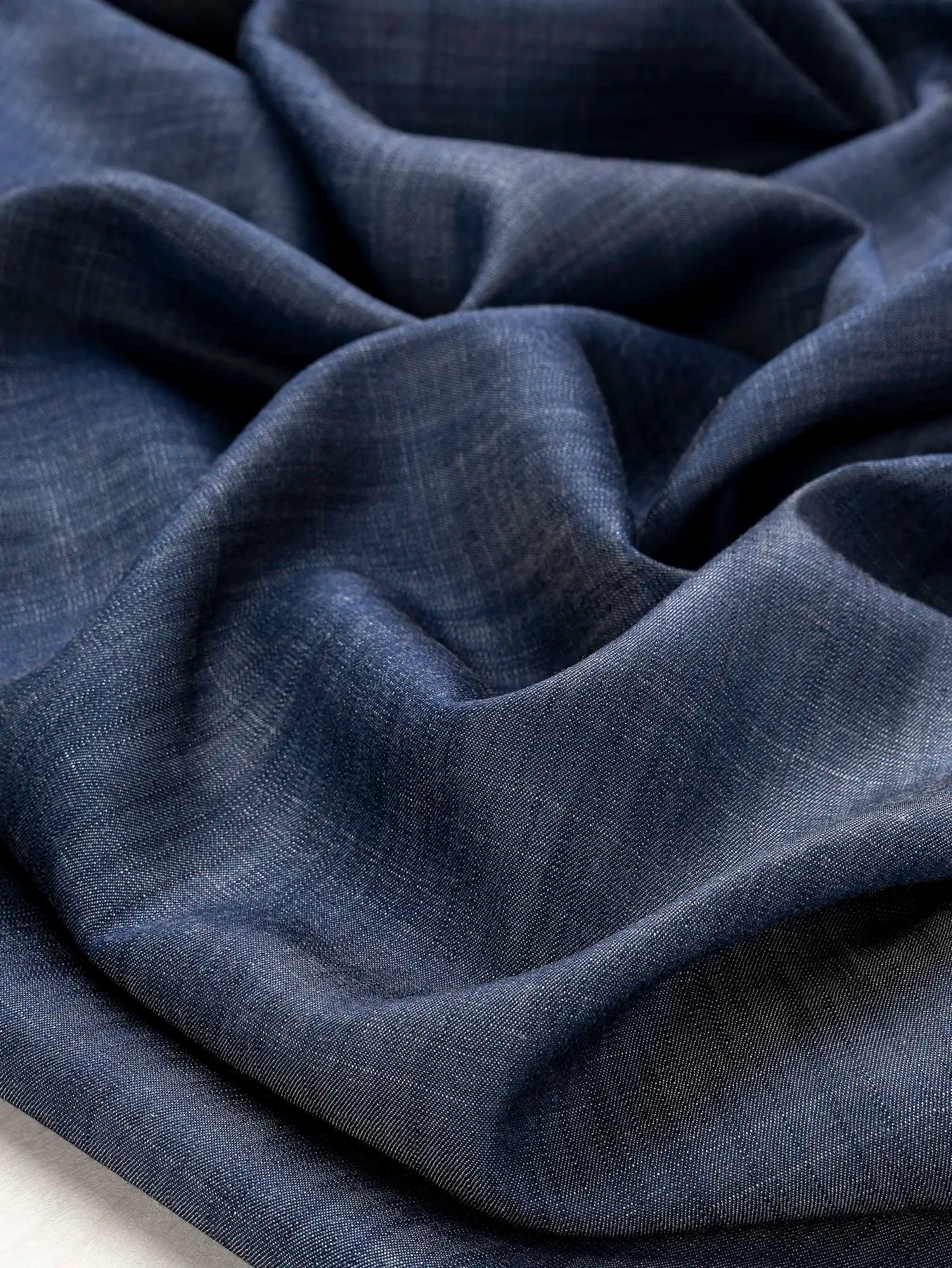 F-DEA214-Cotton-Lyocell-Chambray-Deadstock-Denim-Core-Fabrics-scrunched.webp