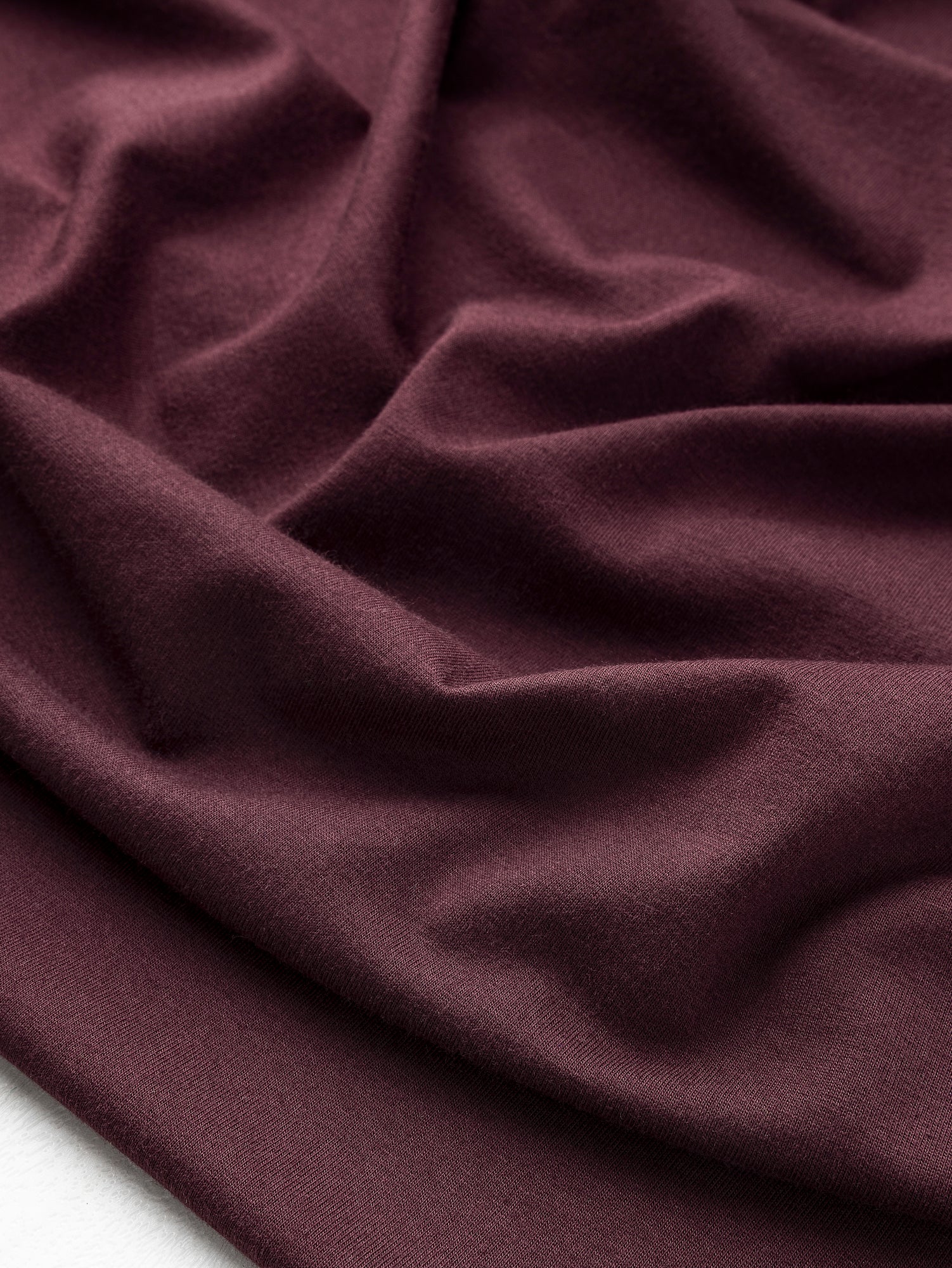 F-DEA125-001-Cotton-Modal-Stretch-Knit-Deadstock-Bordeaux-Core-Fabrics-scrunched.JPG