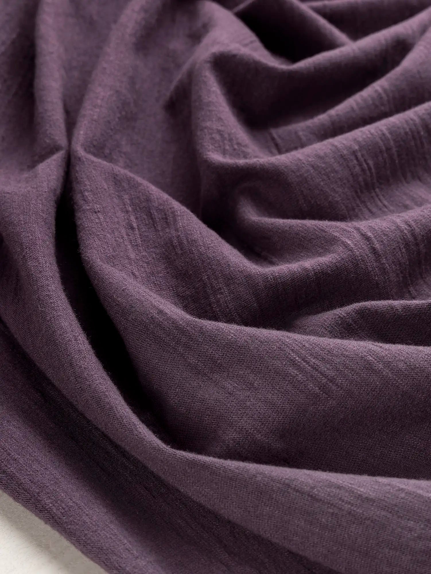 F-DEA210-Cotton-Polyester-Textured-Knit-Deadstock-Grape-Core-Fabrics-scrunched.webp