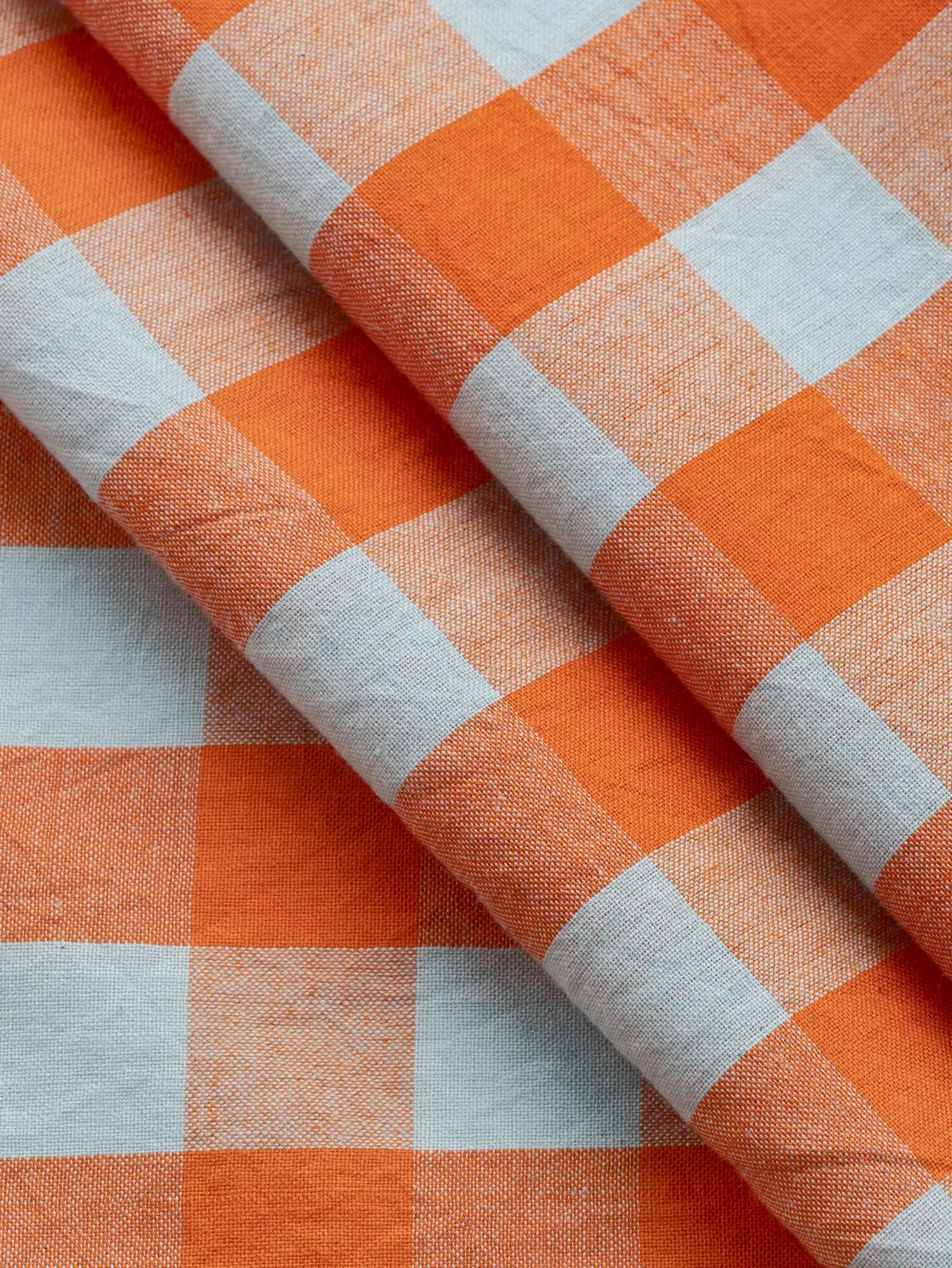 F-COT373-004-Creamsicle-Handwoven-Gingham-Cotton-Mint-and-Orange-Core-Fabrics-fold.webp