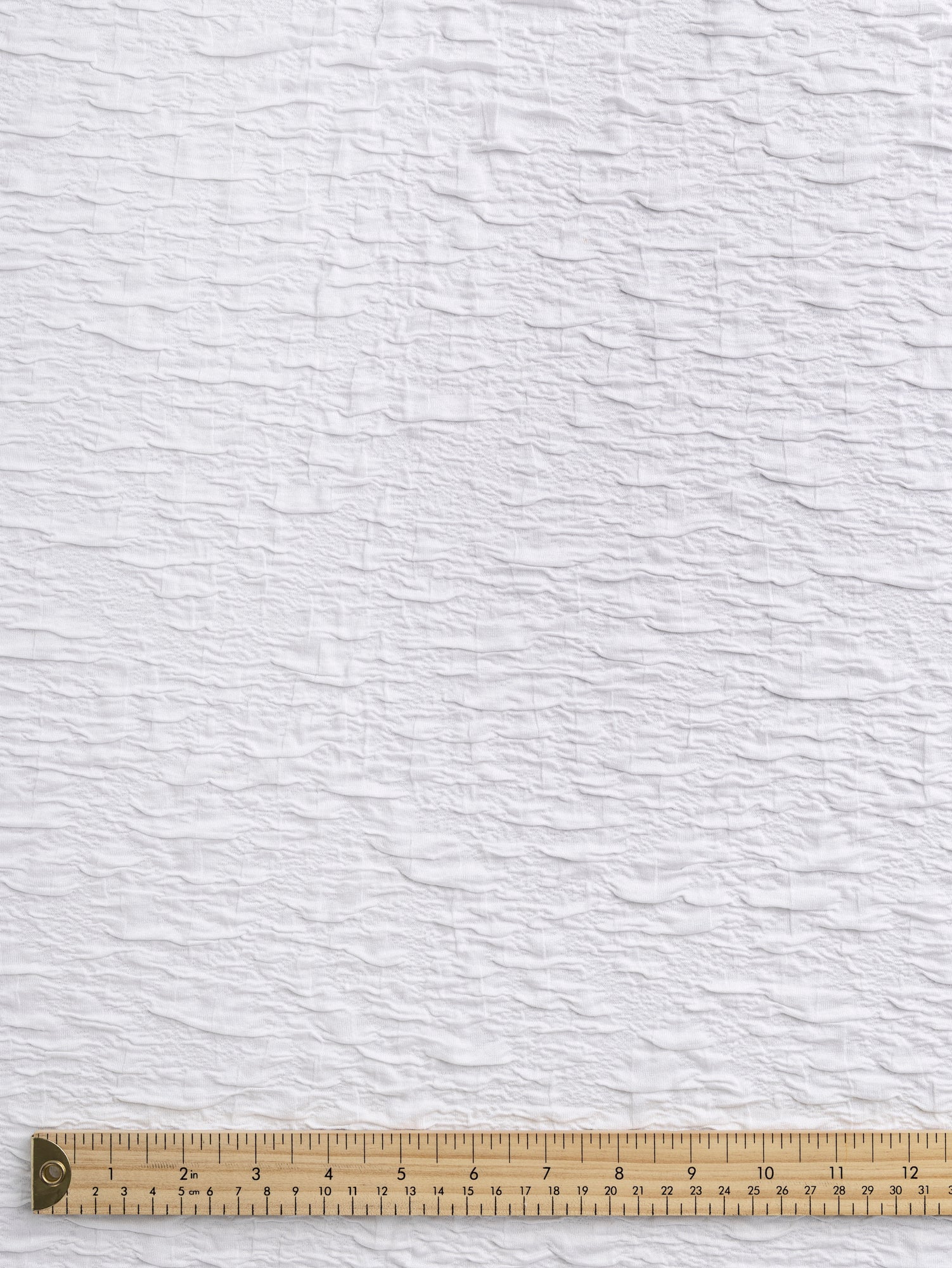 F-DEA118-Crinkle-Stretch-Double-Knit-Deadstock-White-Core-Fabrics-ruler.JPG