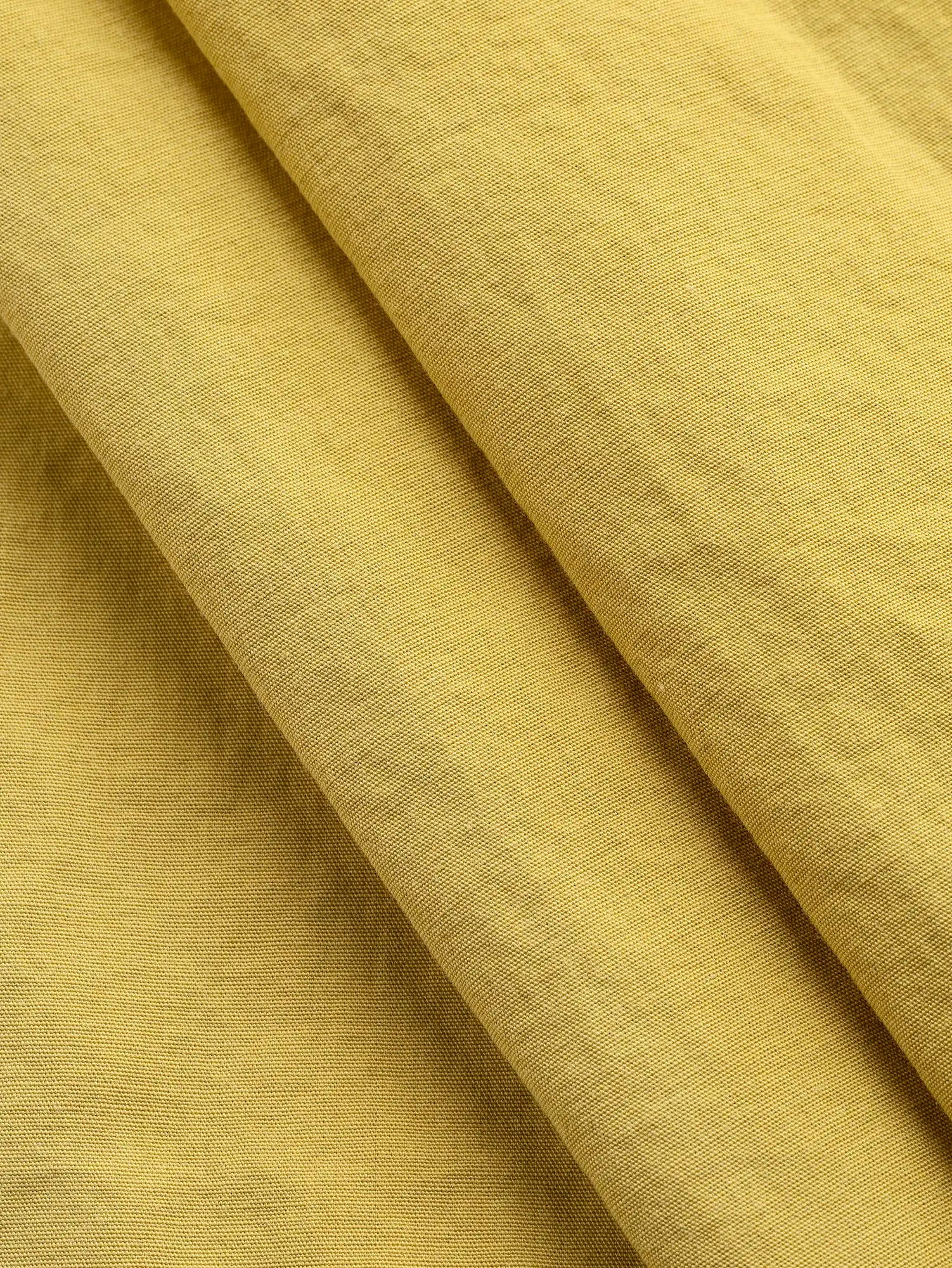 F-DEA220-Crinkled-Cotton-Blend-Broadcloth-Deadstock-Mustard-Core-Fabrics-fold.webp