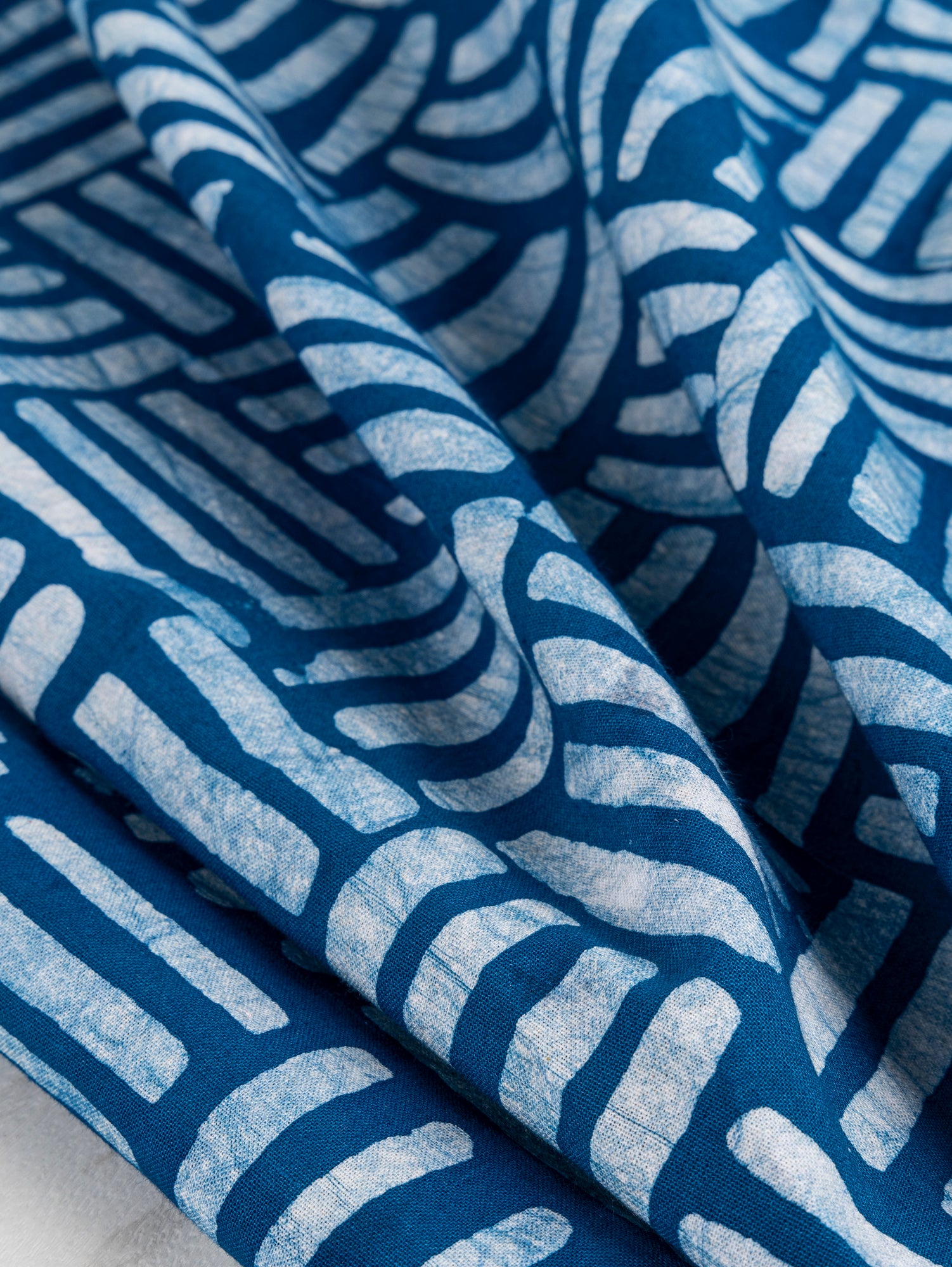 F-COT322-Crossgrid-Artisanal-Cotton-Batik-Teal-White-Core-Fabrics-scrunched