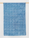 F-COT322-Crossgrid-Artisanal-Cotton-Batik-Teal-White-Core-Fabrics-draped