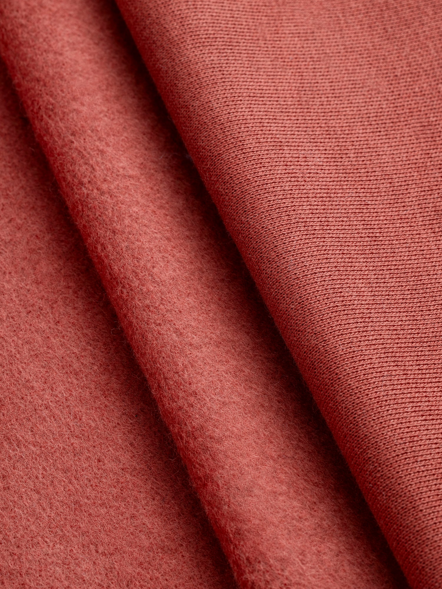 F-COT399-009-Custom-Organic-Cotton-Fleece-Rust-Core-Fabrics-fold.JPG