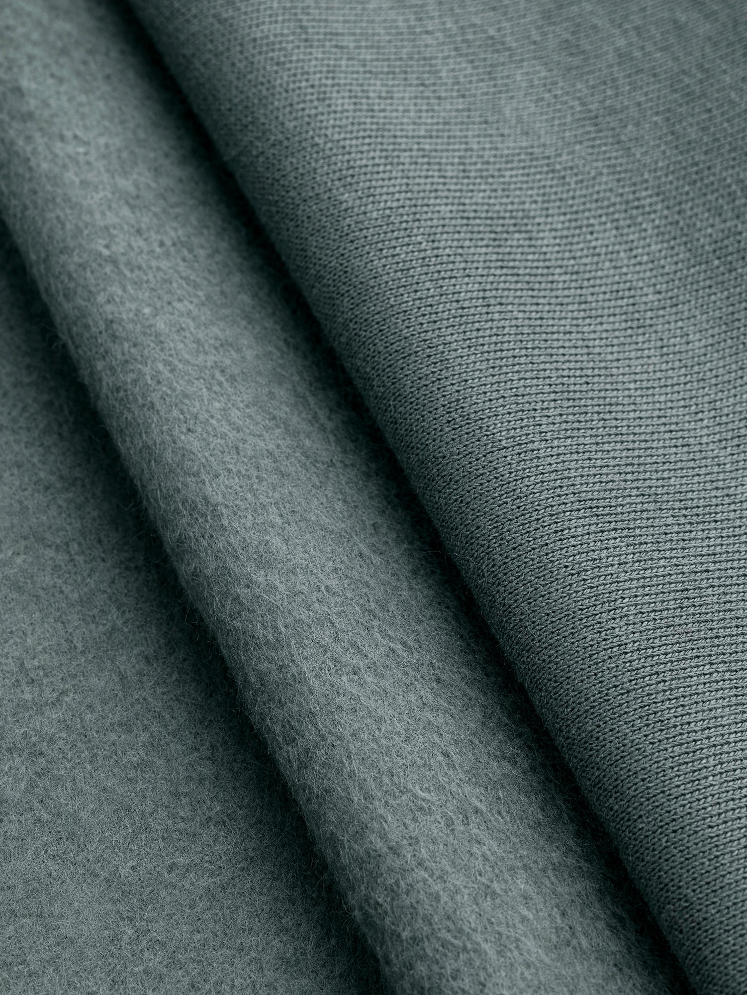 F-COT399-006-Custom-Organic-Cotton-Fleece-Smokey-Pine-Core-Fabrics-fold.JPG
