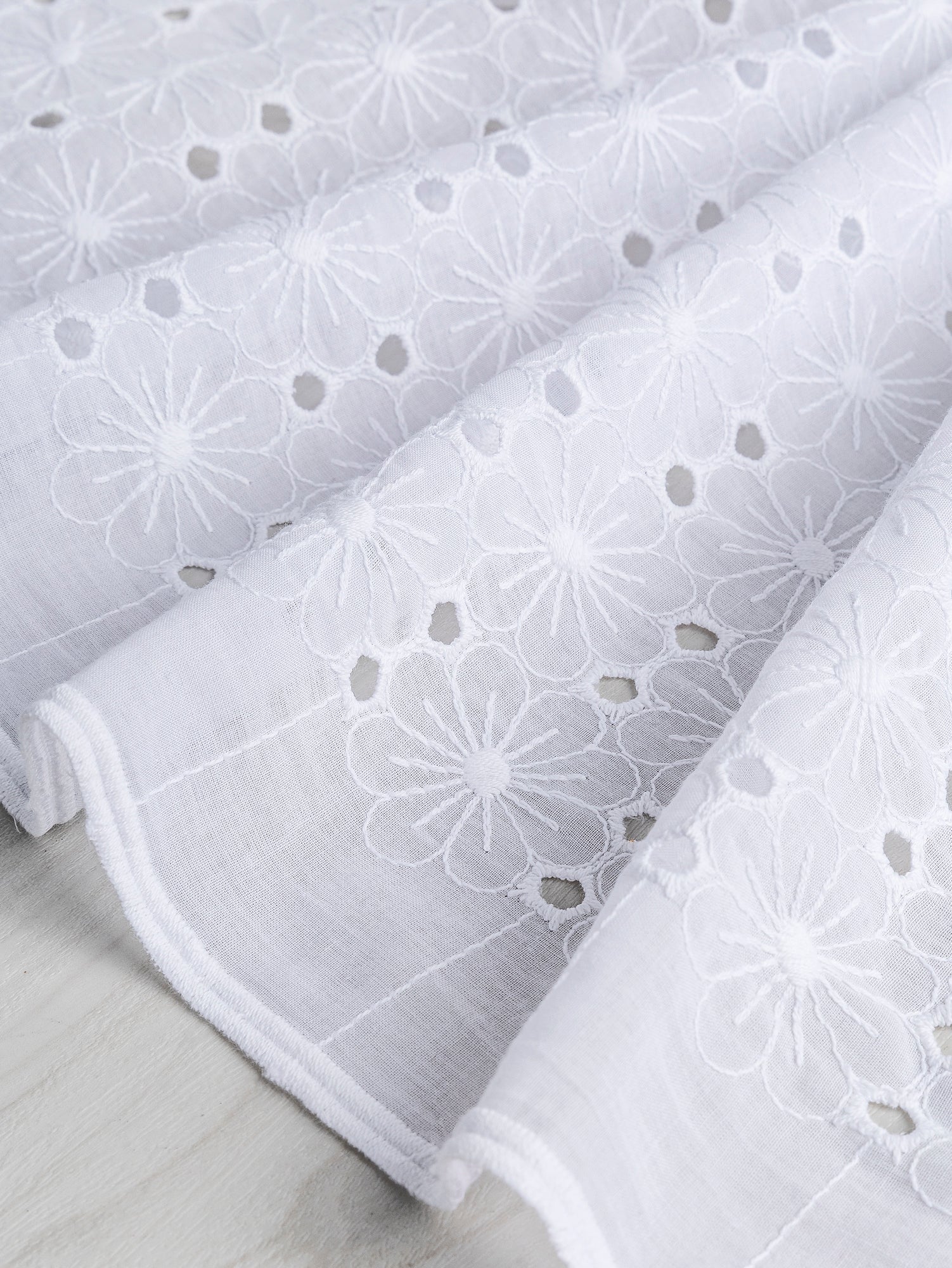 F-COT335-002-Daisy-Cotton-Eyelet-Deadstock-White-Core-Fabrics-scrunched