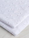 F-COT335-002-Daisy-Cotton-Eyelet-Deadstock-White-Core-Fabrics-fold