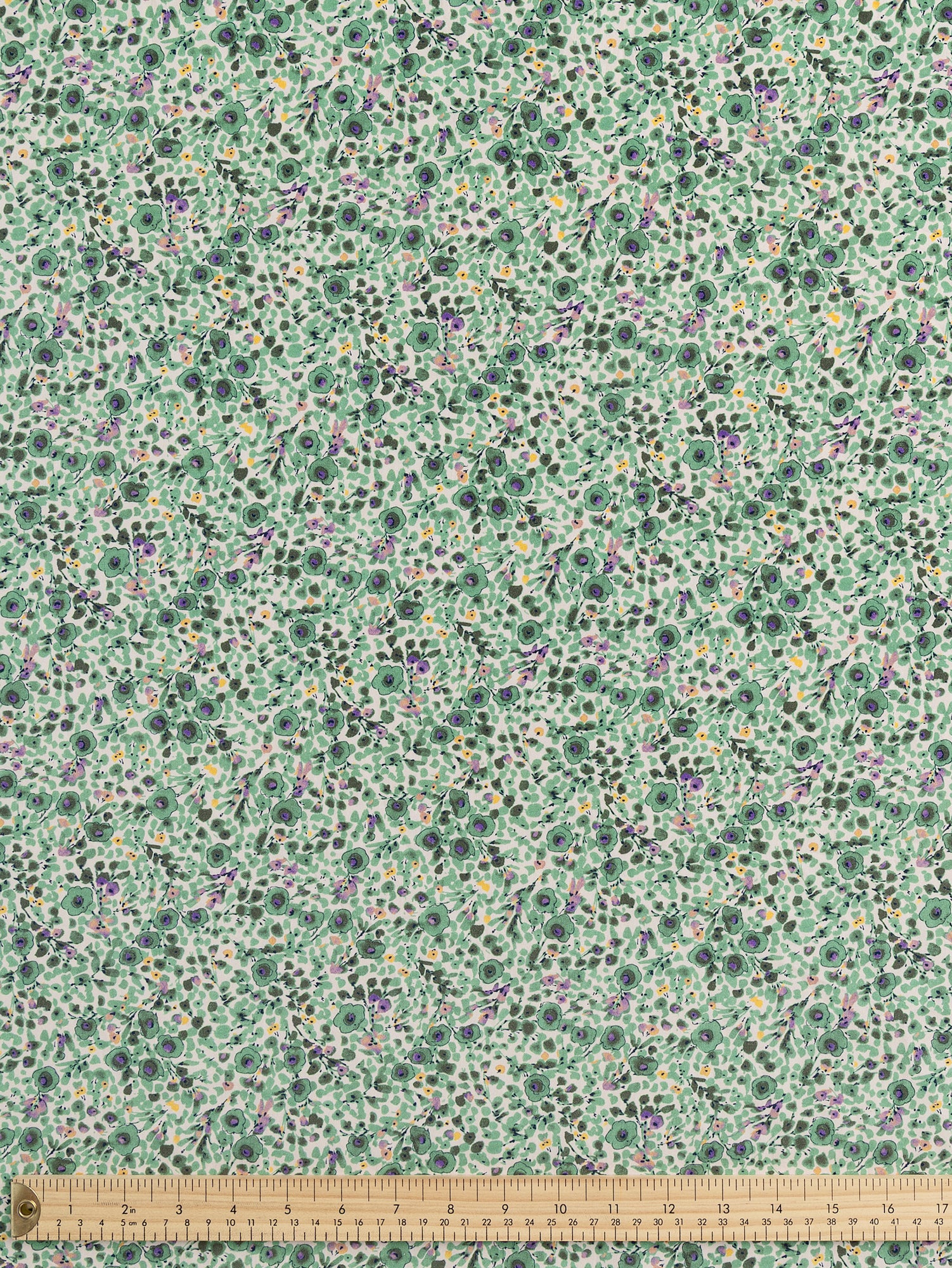 F-COT386-Ditzy-Bloom-Sketch-Print-Cotton-Poplin-Cream-Green-Purple-Core-Fabrics-ruler.JPG