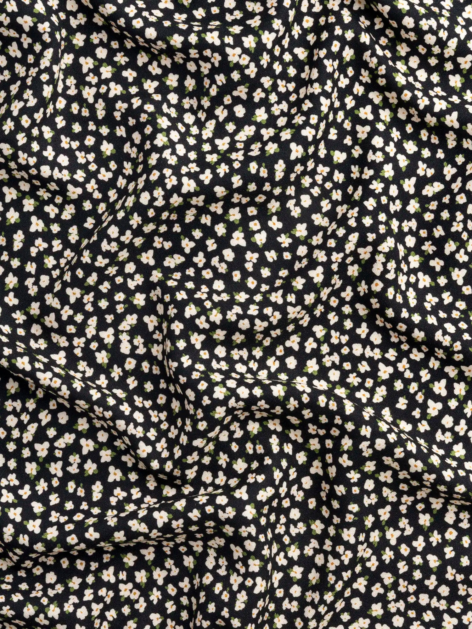 F-VIS306-Ditzy-Daisy-Print-Viscose-Crepe-Black-Ivory-and-Olive-Core-Fabrics-scrunched.webp