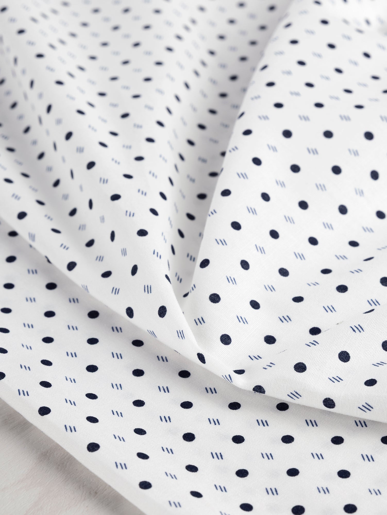 F-DEA035-002-Ditzy-Dot-Stripe-Cotton-Shirting-Deadstock-White-Navy-Core-Fabrics-scrunched.JPG