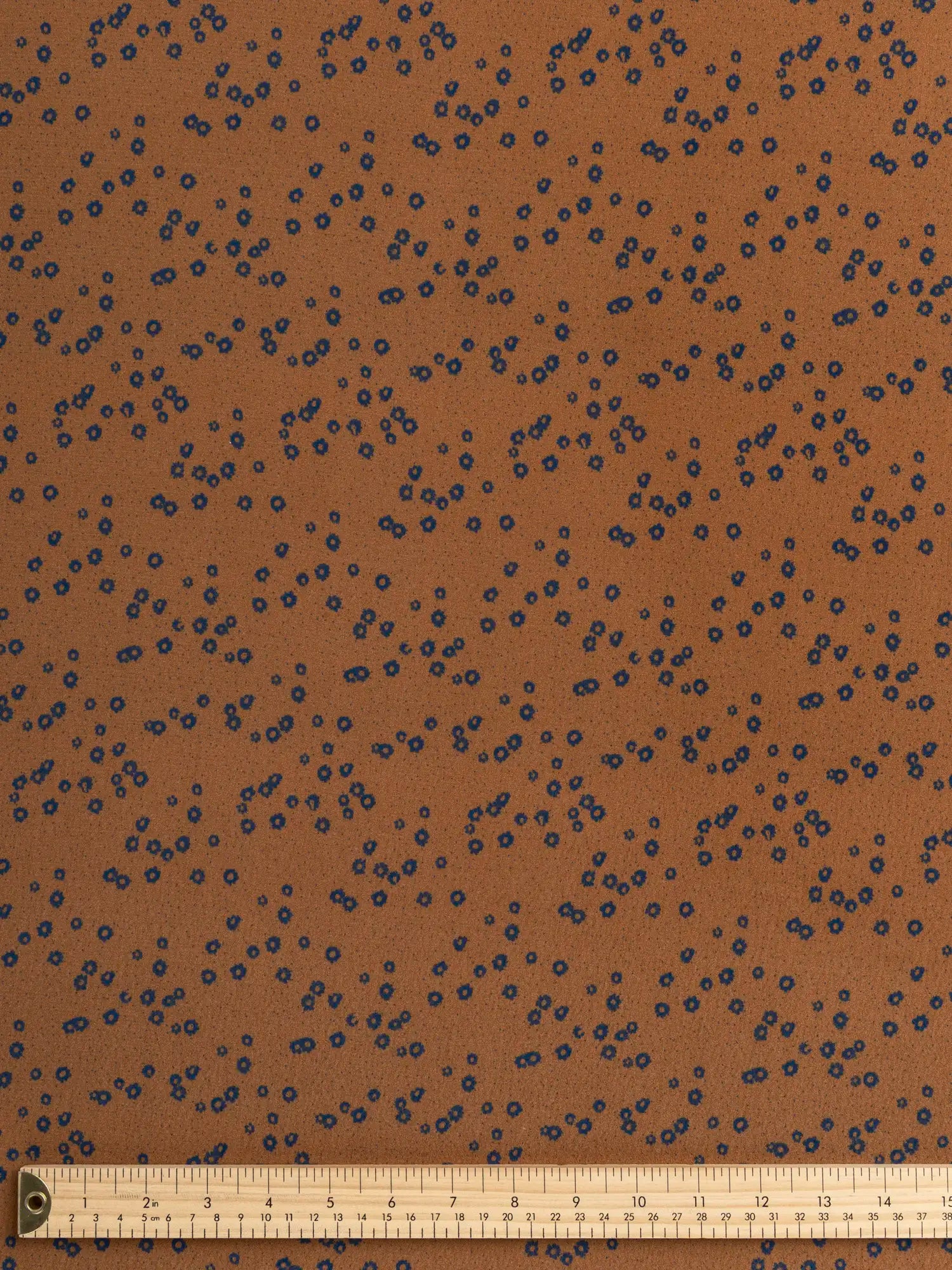 F-VIS296-Ditzy-Flower-Dot-Print-Ecovero-Crepe-de-Chine-Caramel-Indigo-Core-Fabrics-ruler.webp