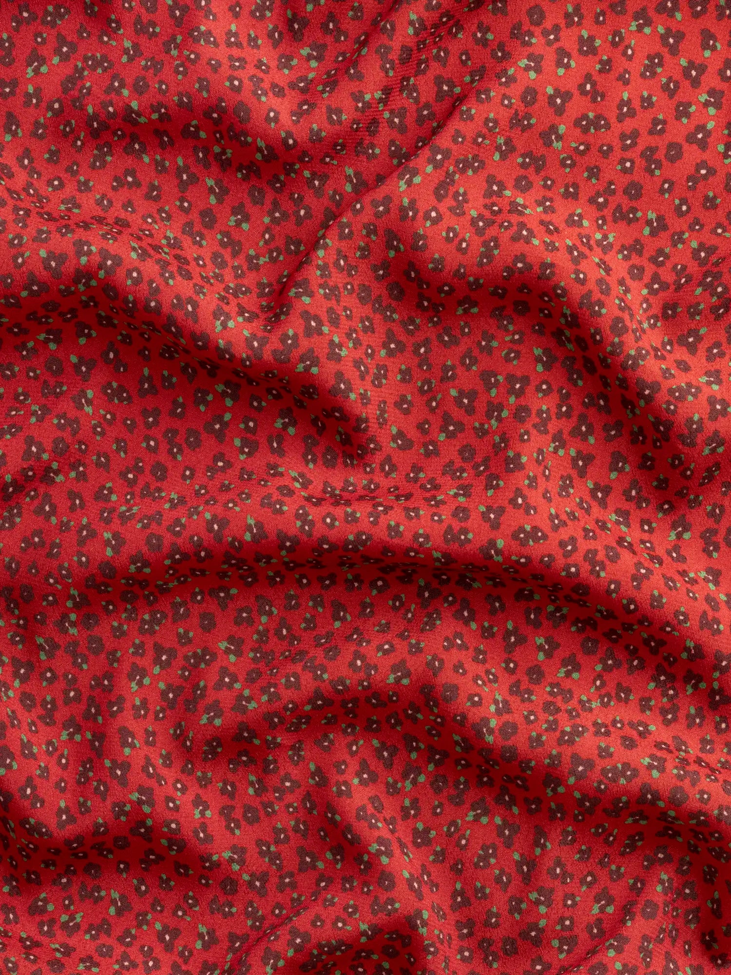 F-VIS297-Ditzy-Flower-Print-Ecovero-Crepe-de-Chine-Ruby-Burgundy-and-Leaf-Core-Fabrics-scrunched.webp