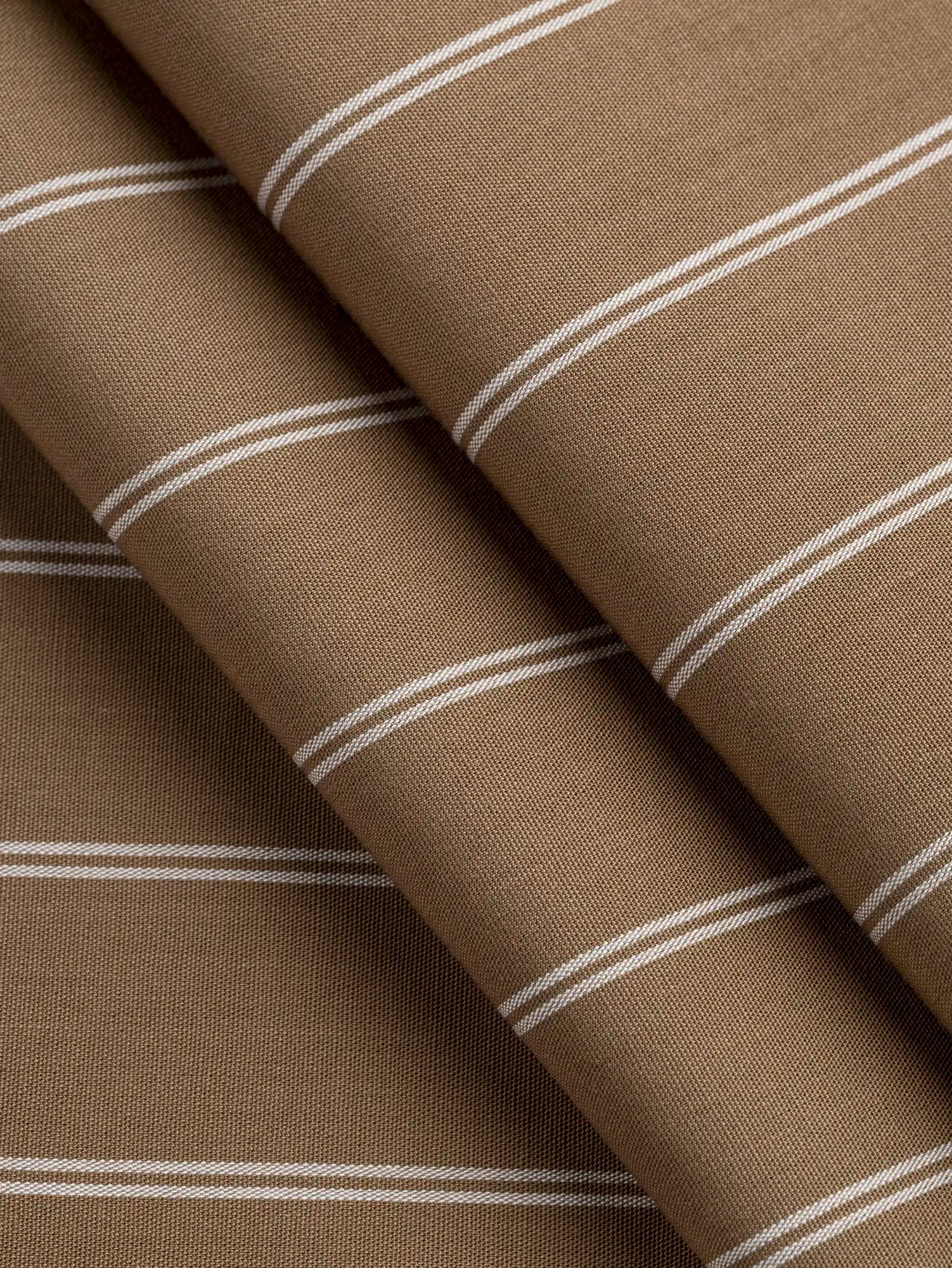F-COT456-001-Double-Stripe-Organic-Cotton-Shirting-Toffee-Core-Fabrics-fold.webp