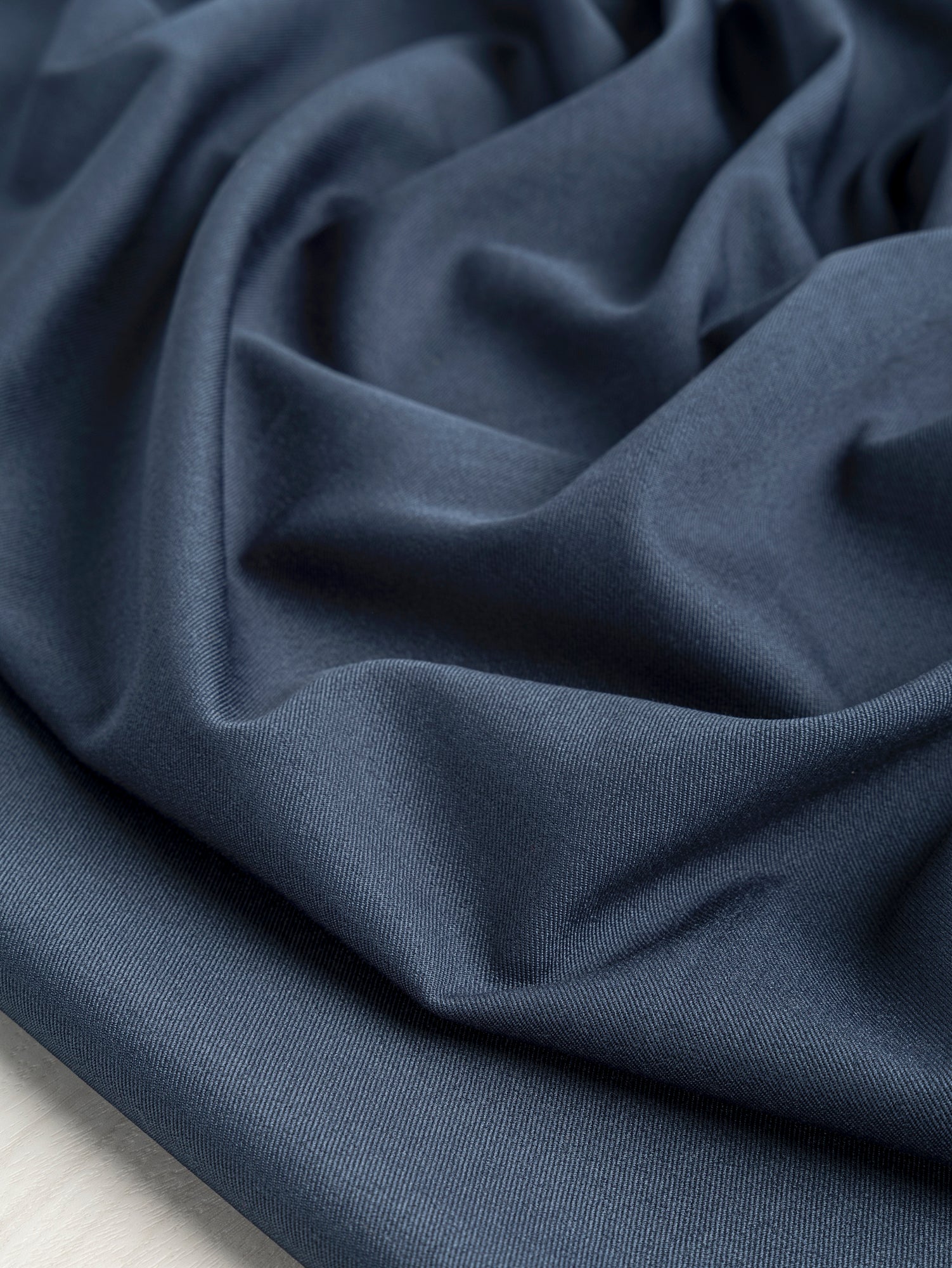 F-DEA053-Drapey-Slight-Stretch-Twill-Deadstock-Navy-Core-Fabrics-scrunched.JPG