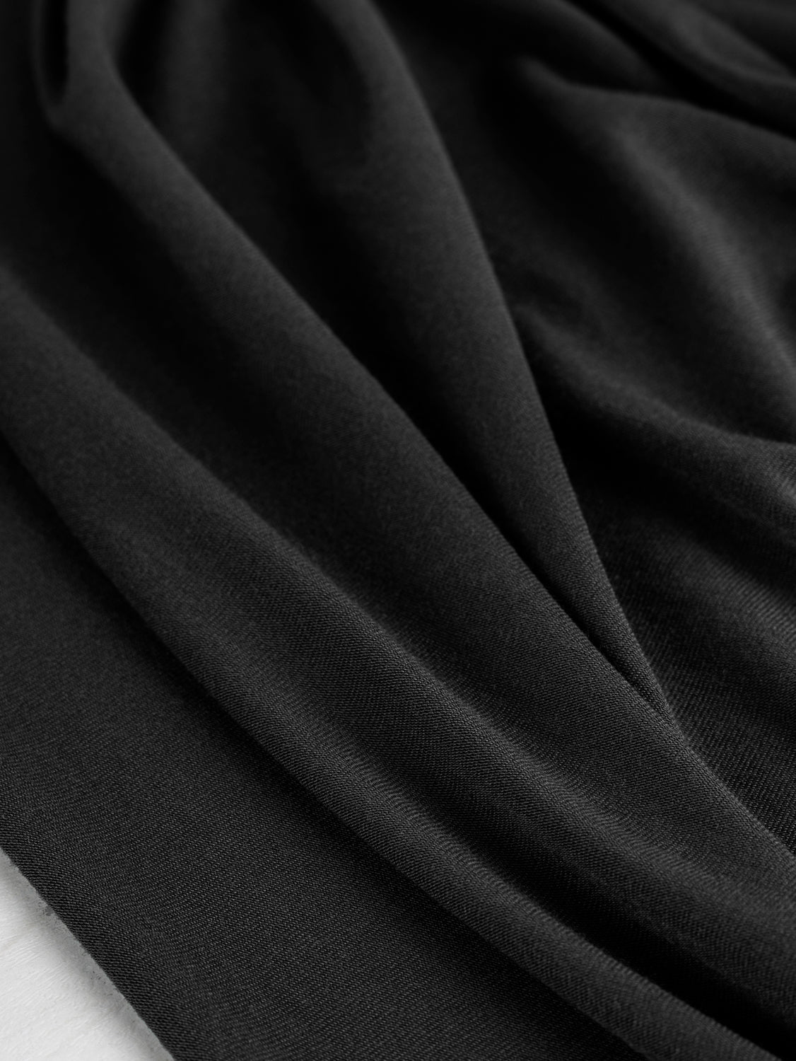 Drapey Tencel Modal Stretch Jersey Knit - Black | Core Fabrics