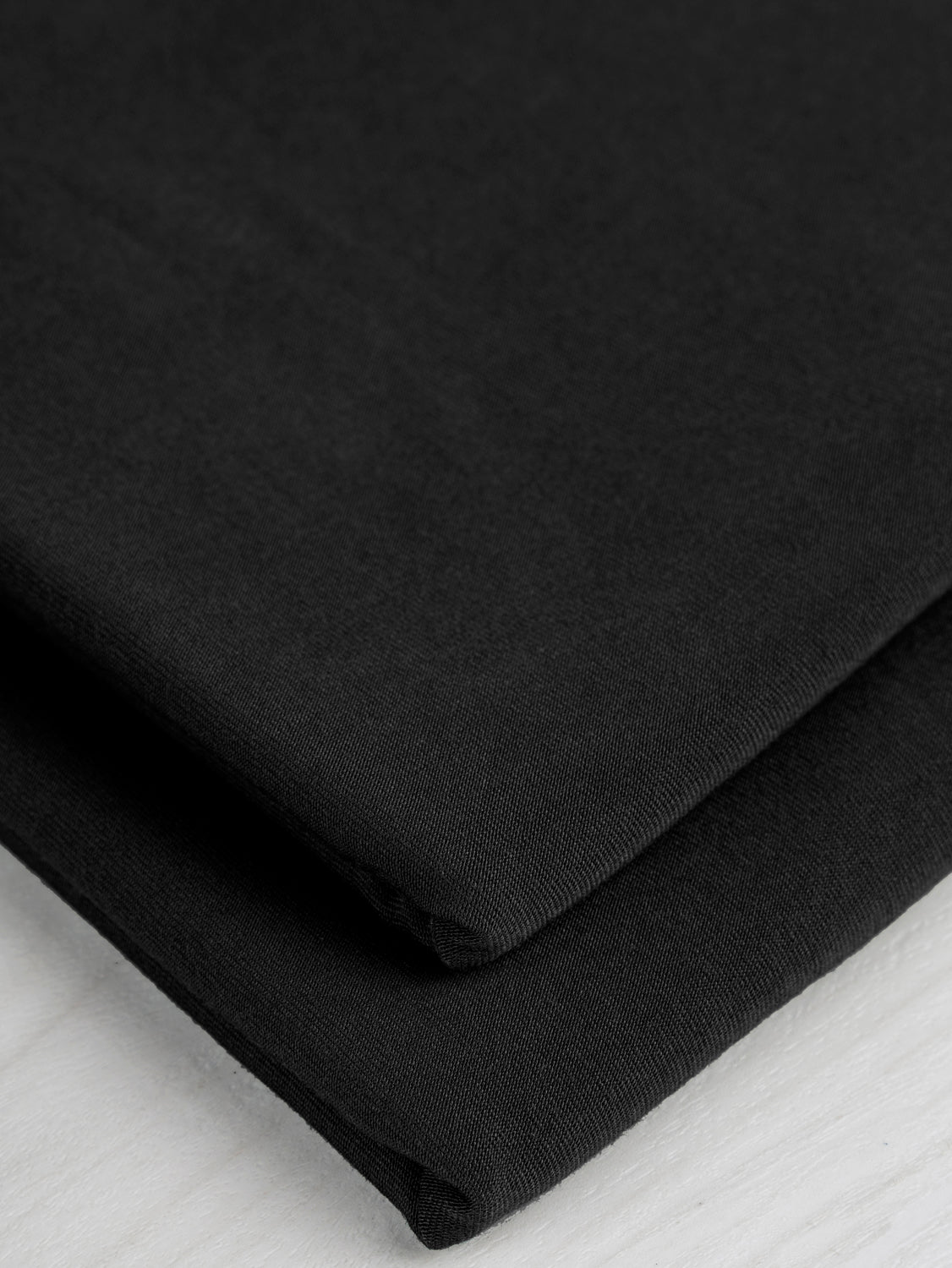 Drapey Tencel Modal Stretch Jersey Knit - Black | Core Fabrics