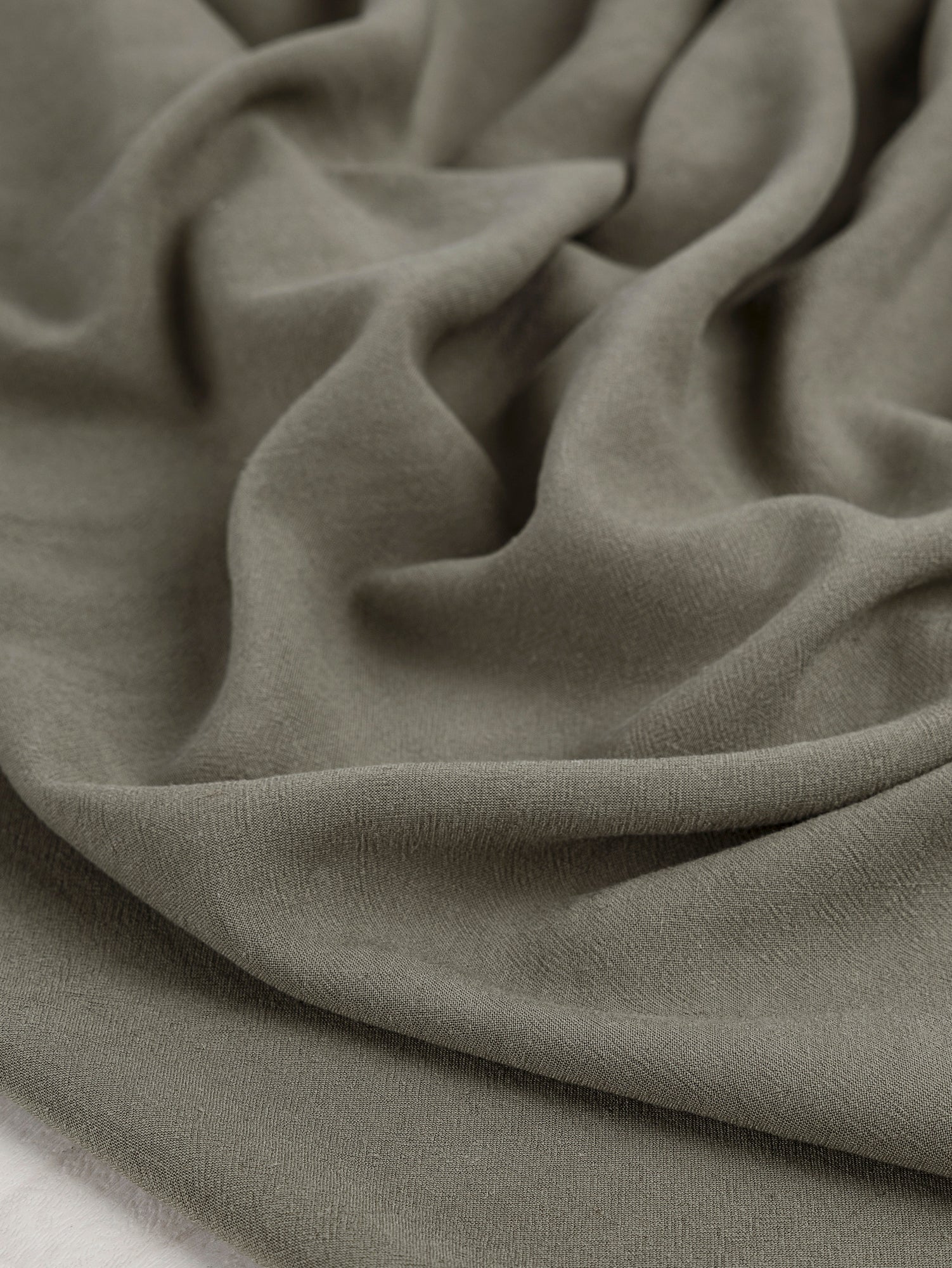 F-DEA045-Drapey-Viscose-Linen-Deadstock-Olive-Core-Fabrics-scrunched.JPG