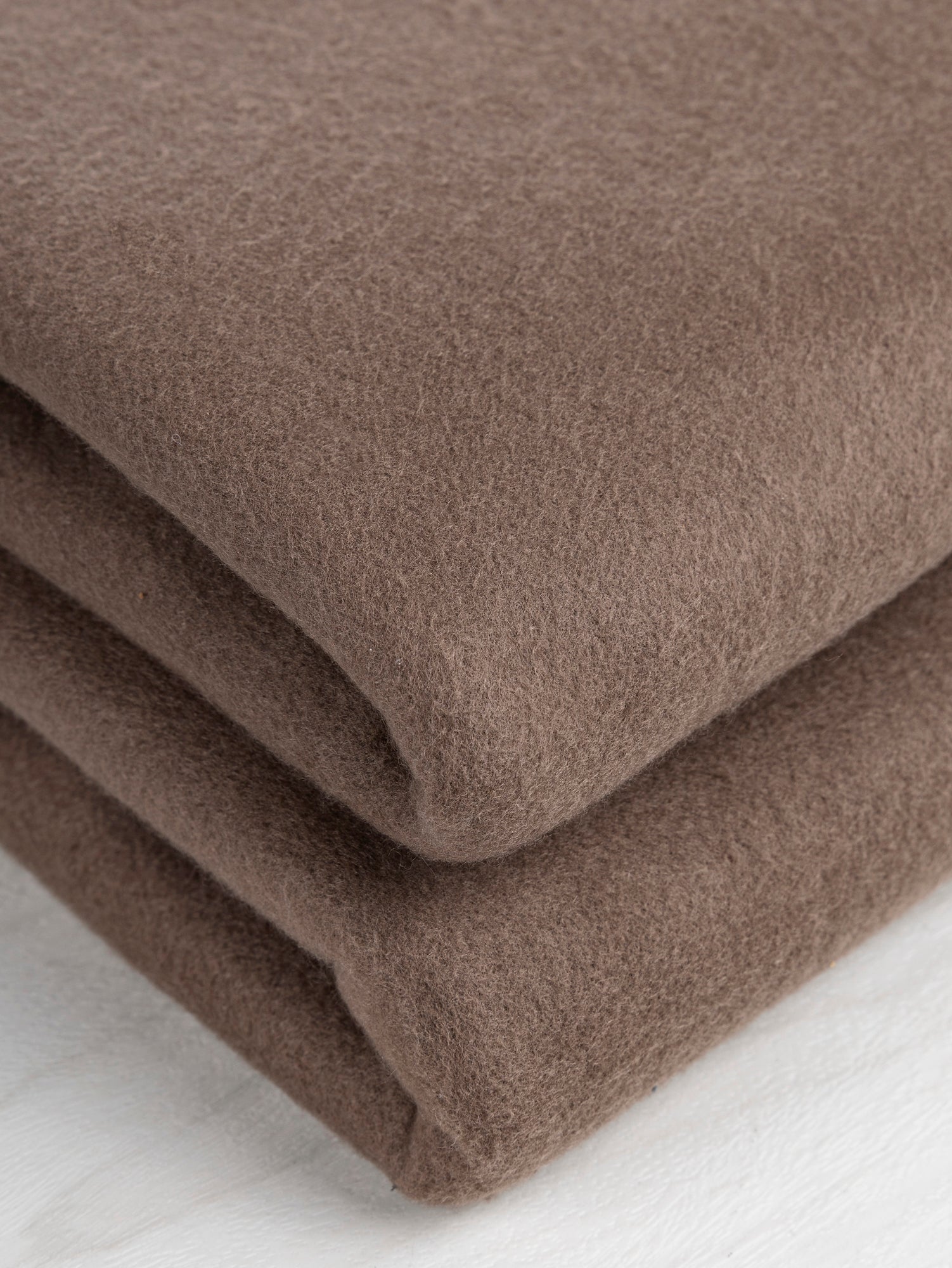 F-COT354-001-Eco-Slight-Stretch-Fleece-Deadstock-Brown-Core-Fabrics-fold.JPG