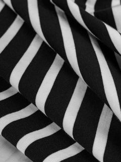Tricot de jersey en coton biologique à rayures bretonnes - Noir + Crème
